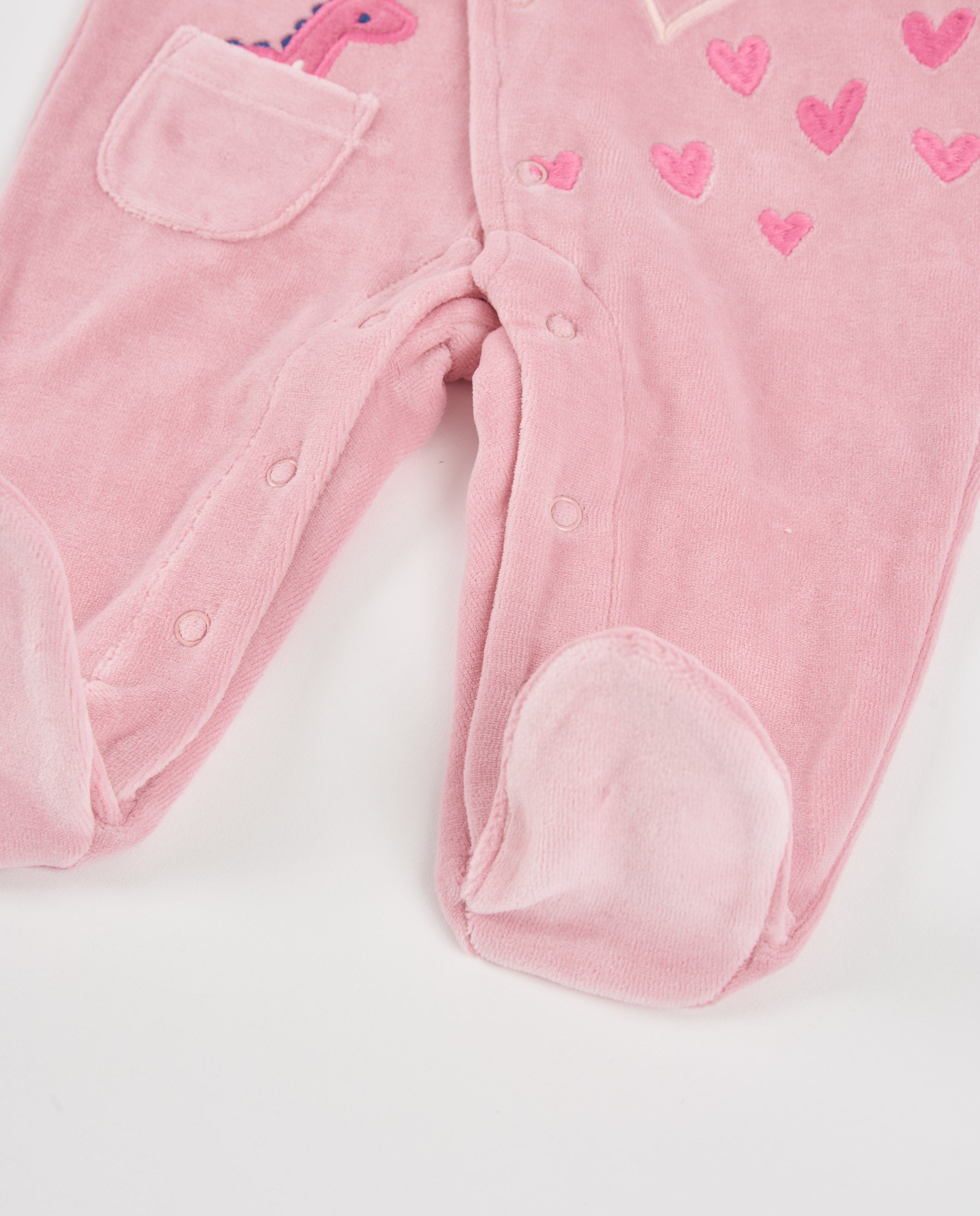 Pelele de punto de bebé con dinosaurios bordados