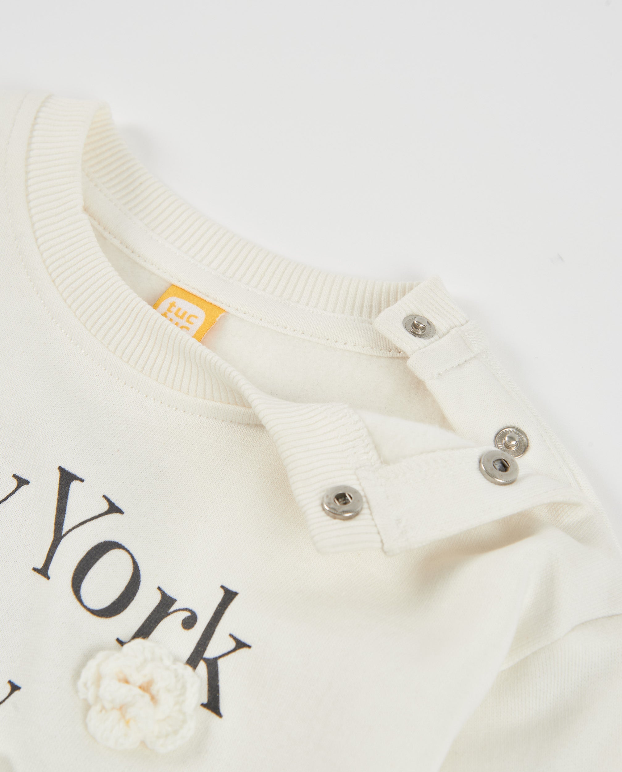 Sudadera de niña de felpa con estampado floral y mensaje frontal
