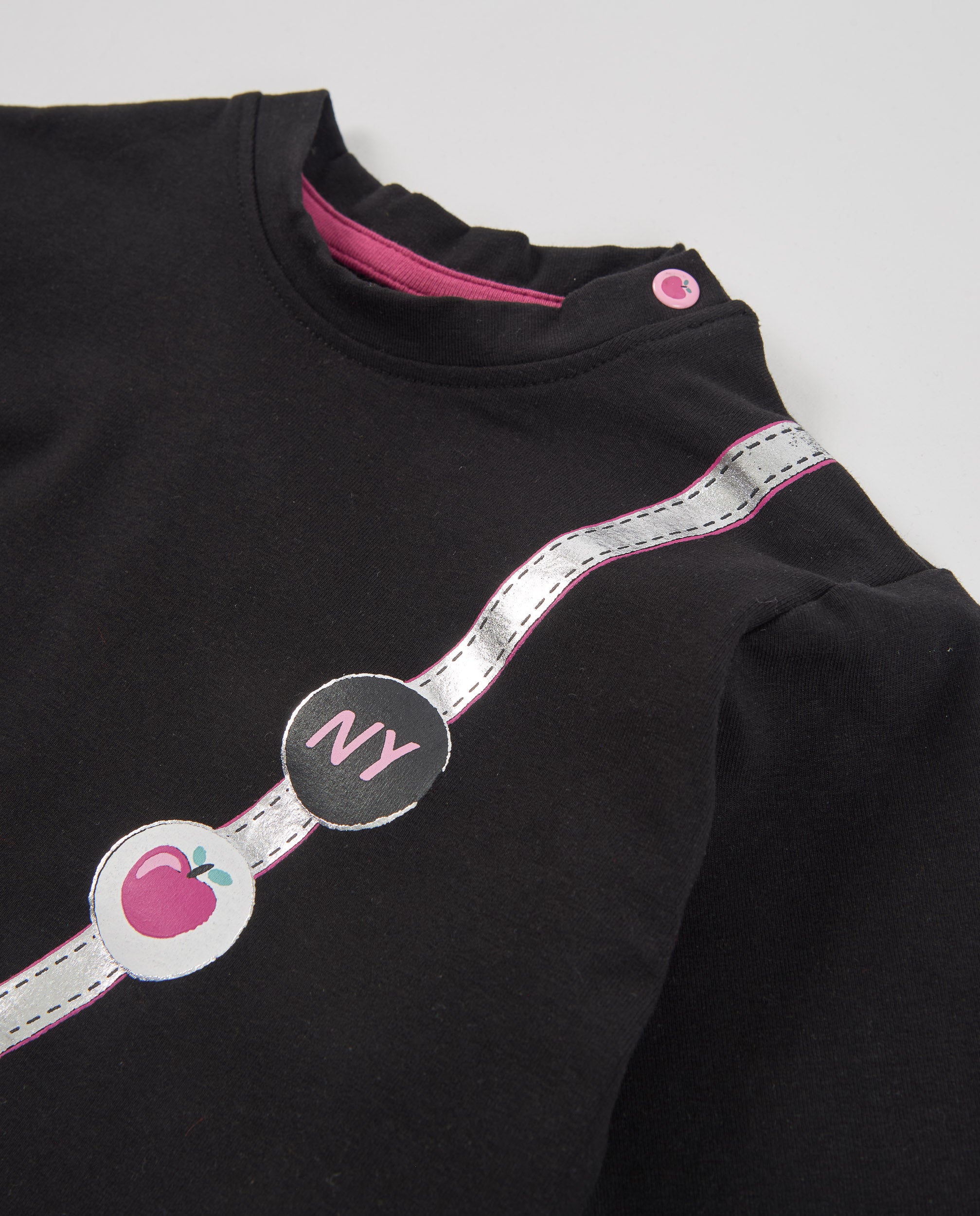 Camiseta de niña de punto con diseño de bandolera y manga larga