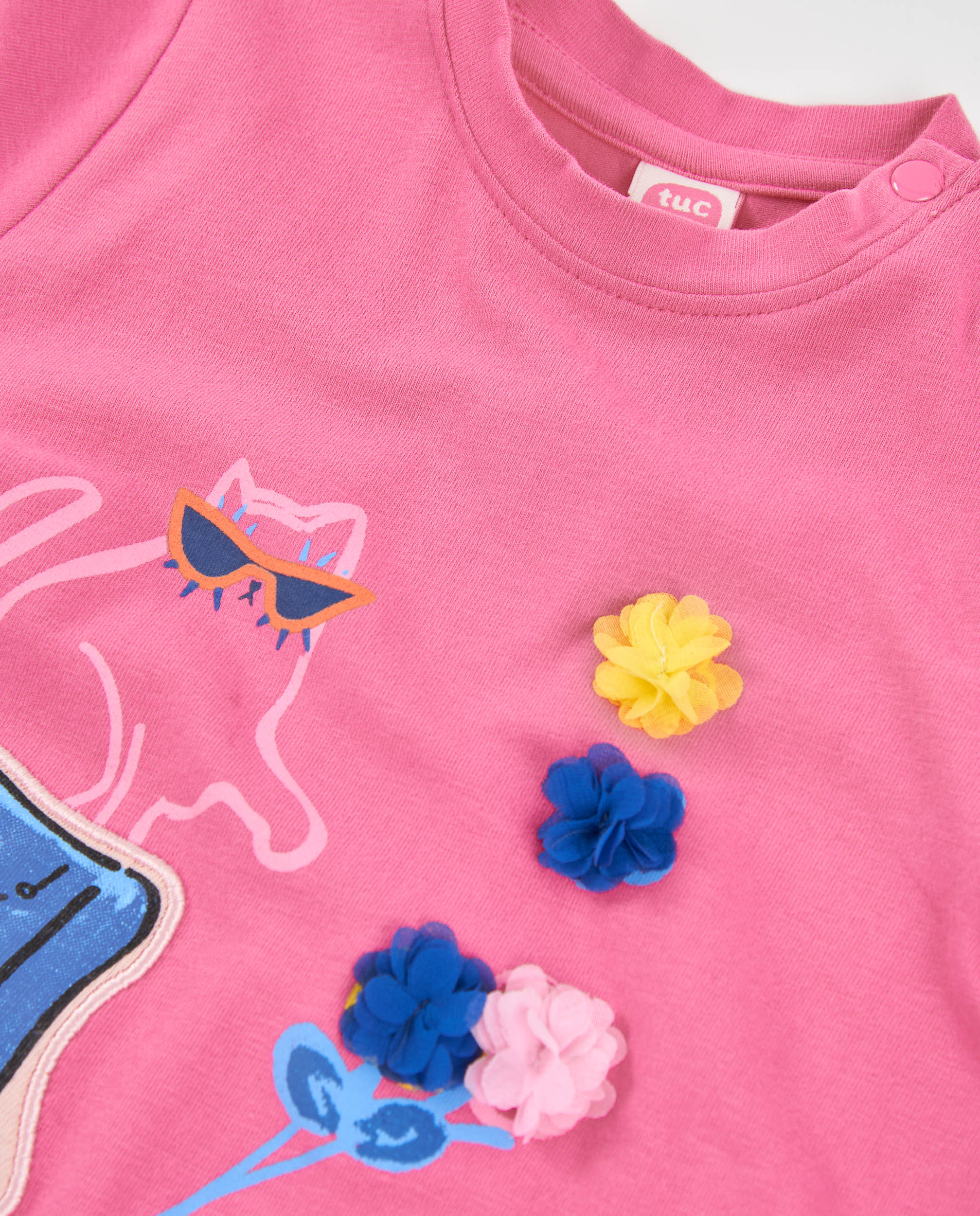 Camiseta de niña de punto con apliques florales y manga larga