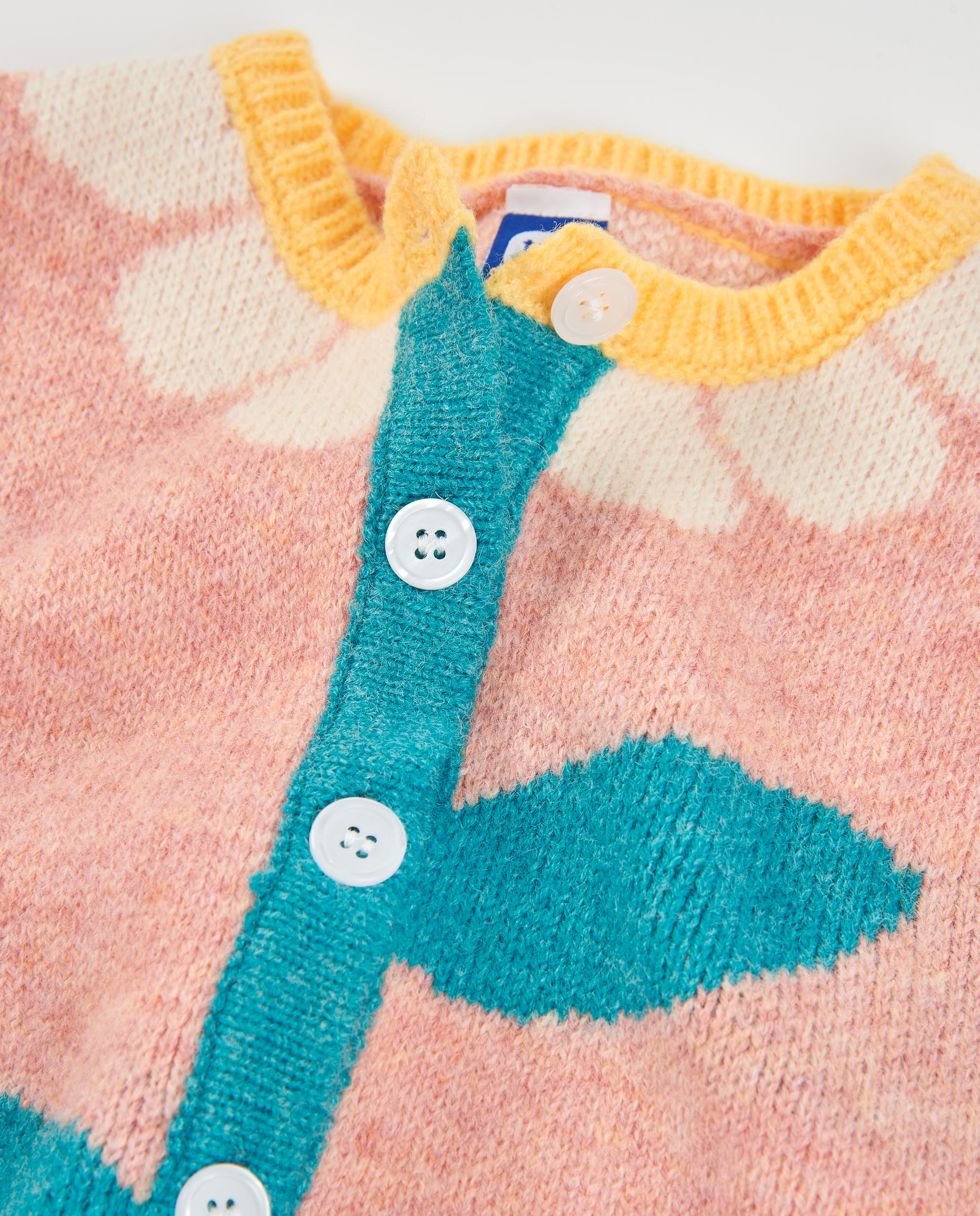 Chaqueta de niña de tricot con bordado y botones