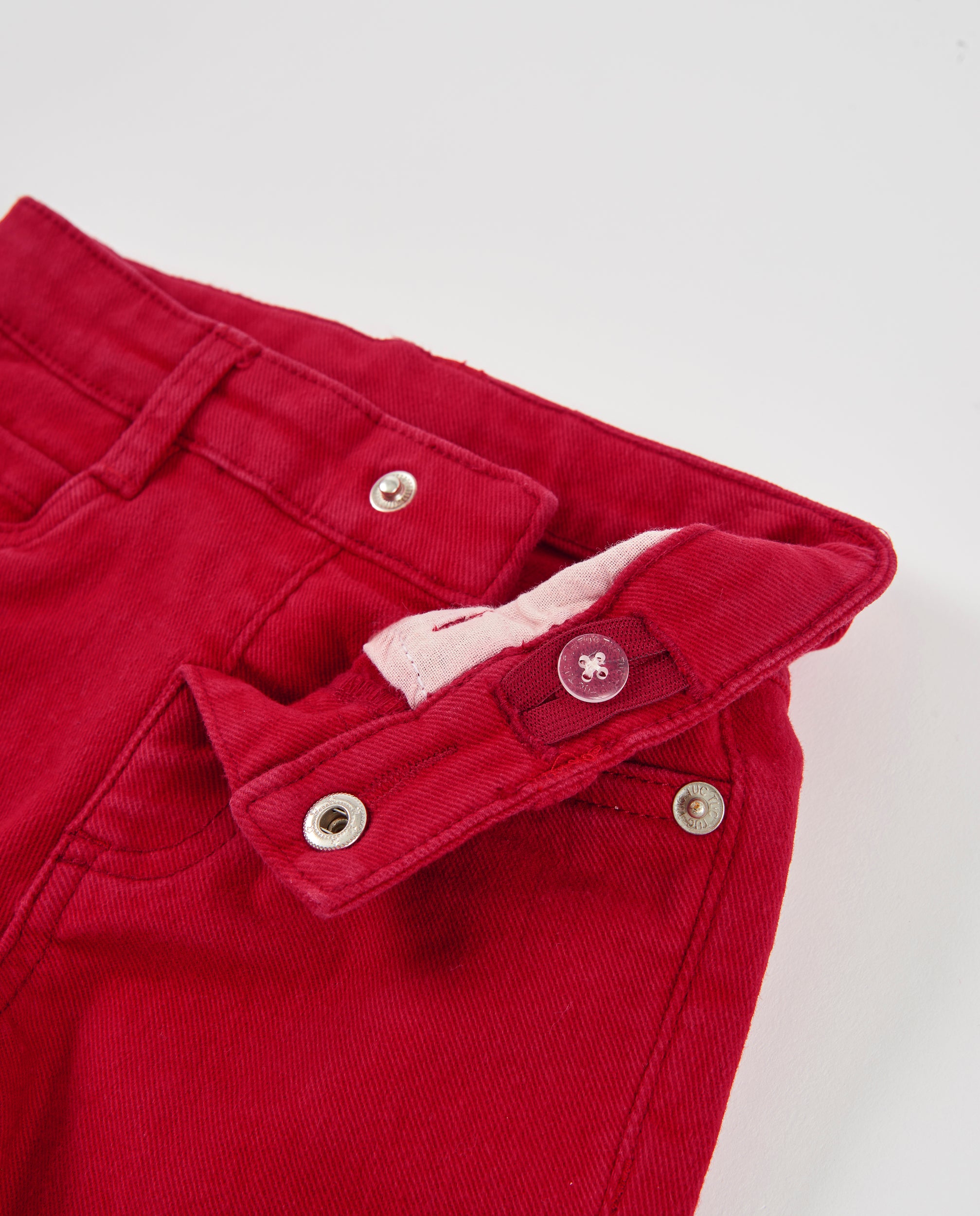 Pantalón de niño de tela plana con bolsillos decorativos