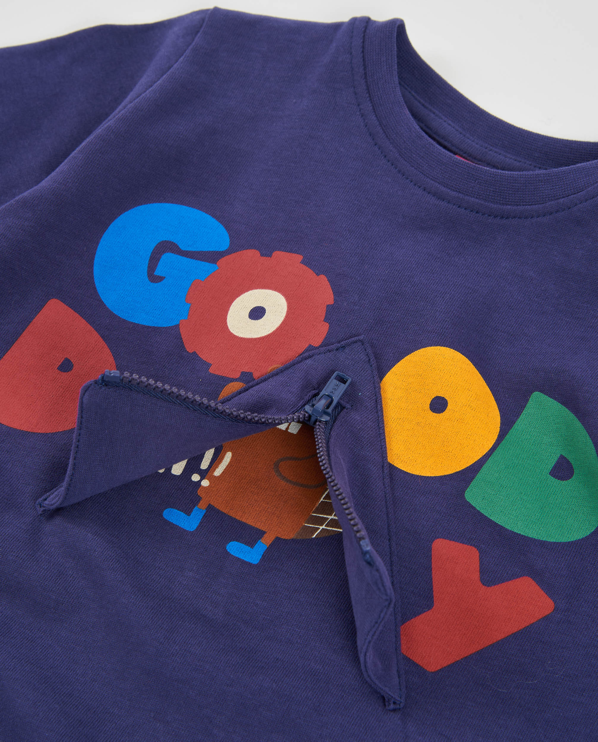 Camiseta de niño de punto con estampado y cremallera decorativa