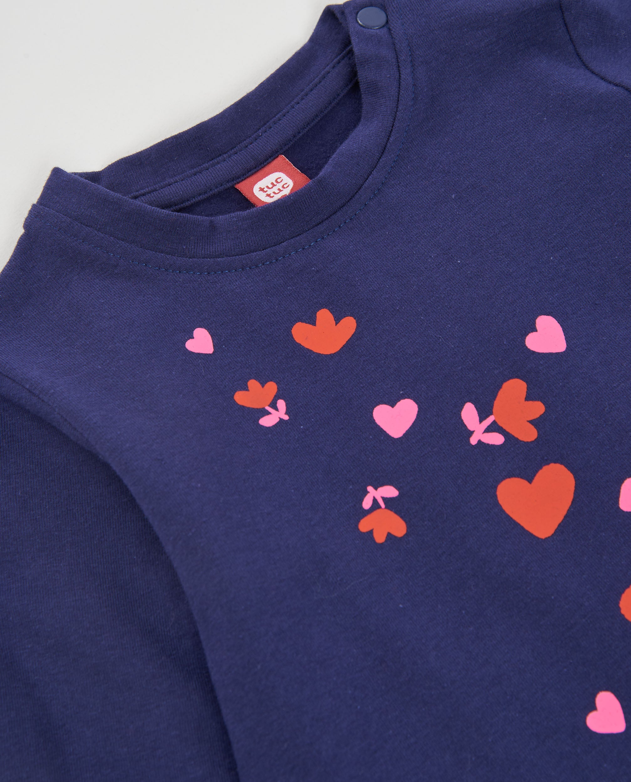 Camiseta de niña de punto con manga larga y estampado de corazones
