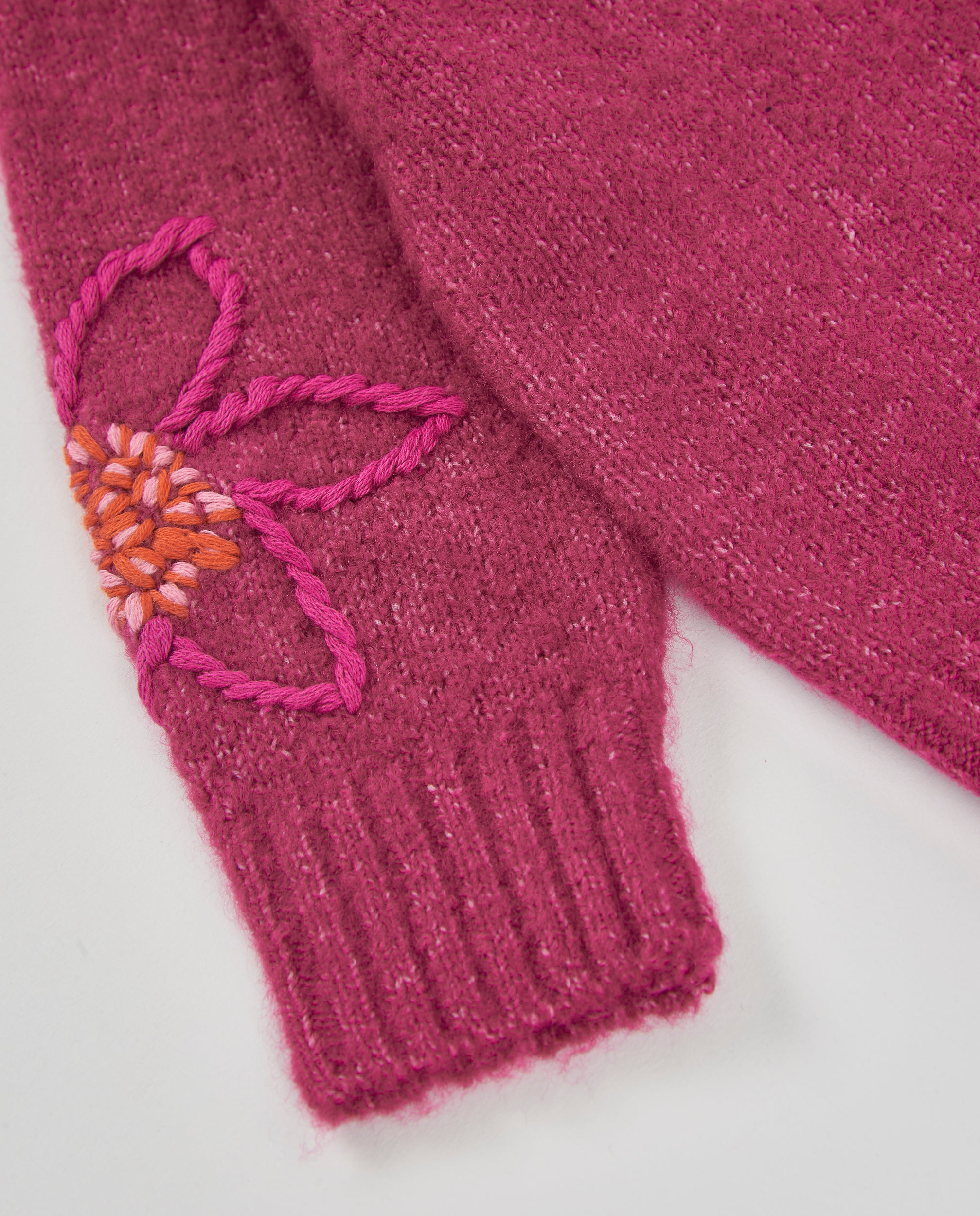 Chaqueta de niña de tricot con bordado floral y diseño envolvente