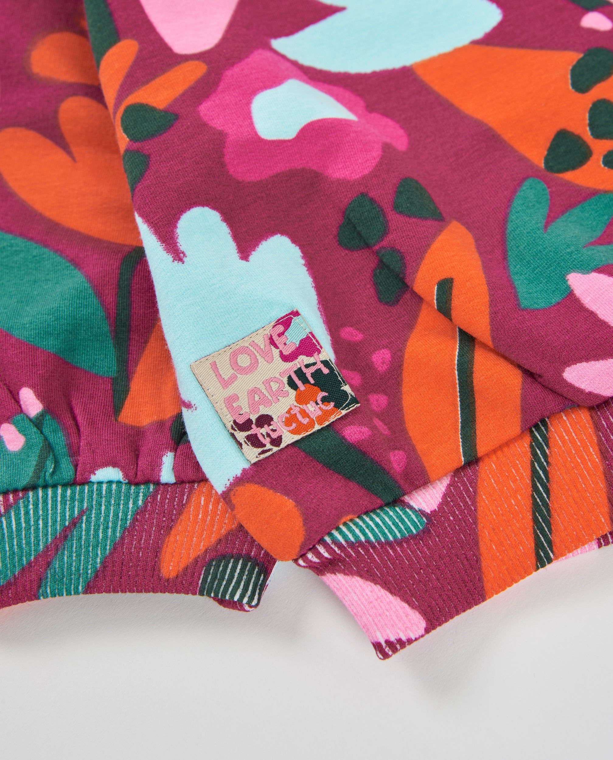 Sudadera de niña de felpa con estampado floral y colores vivos