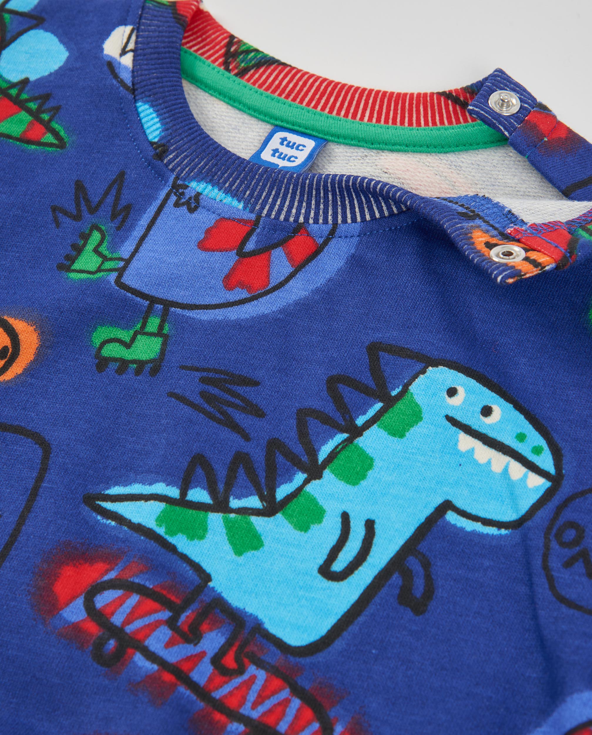 Sudadera de niño de felpa con print de dinosaurios y colores vivos