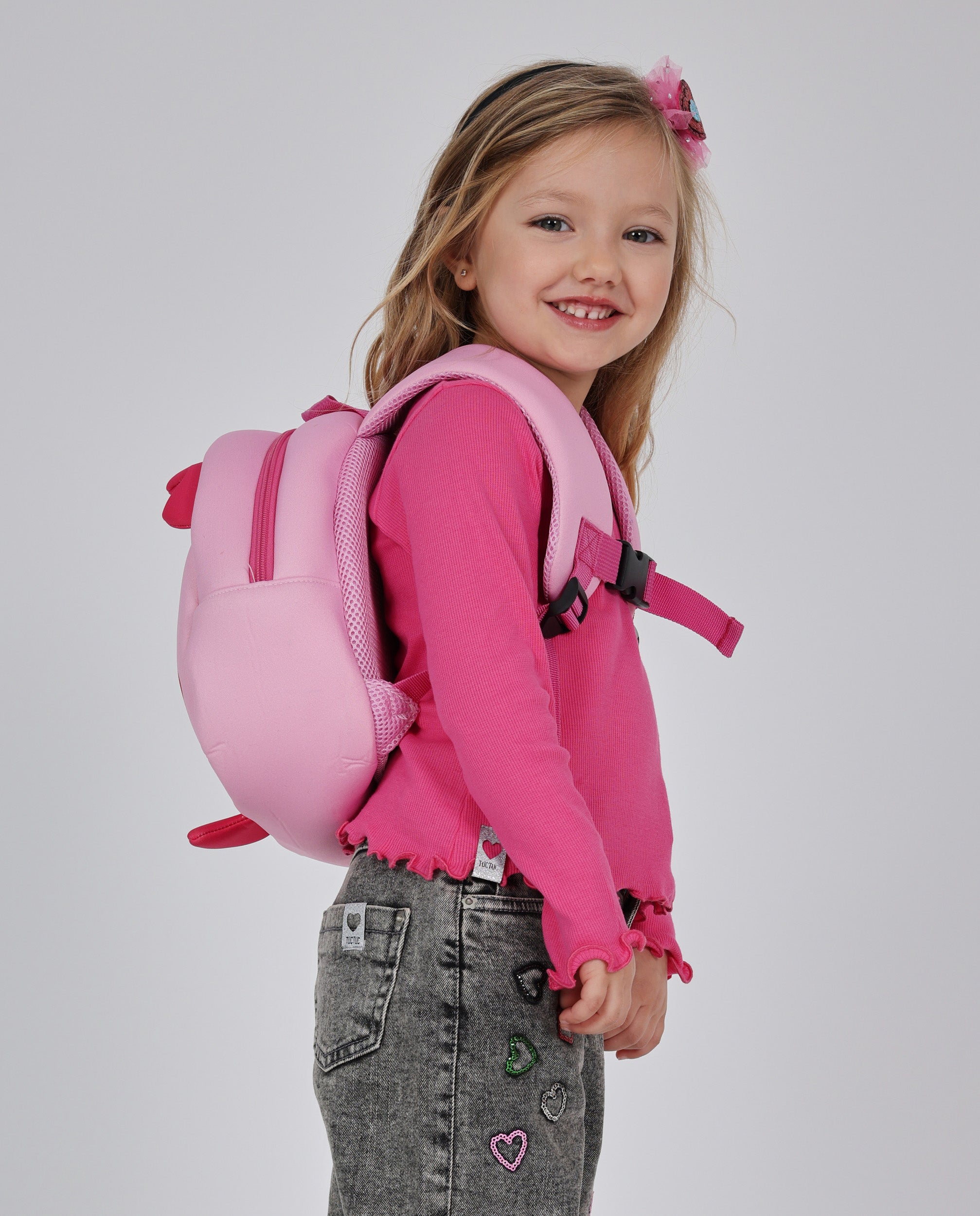 Mochila de niña con diseño divertido y respaldo acolchado