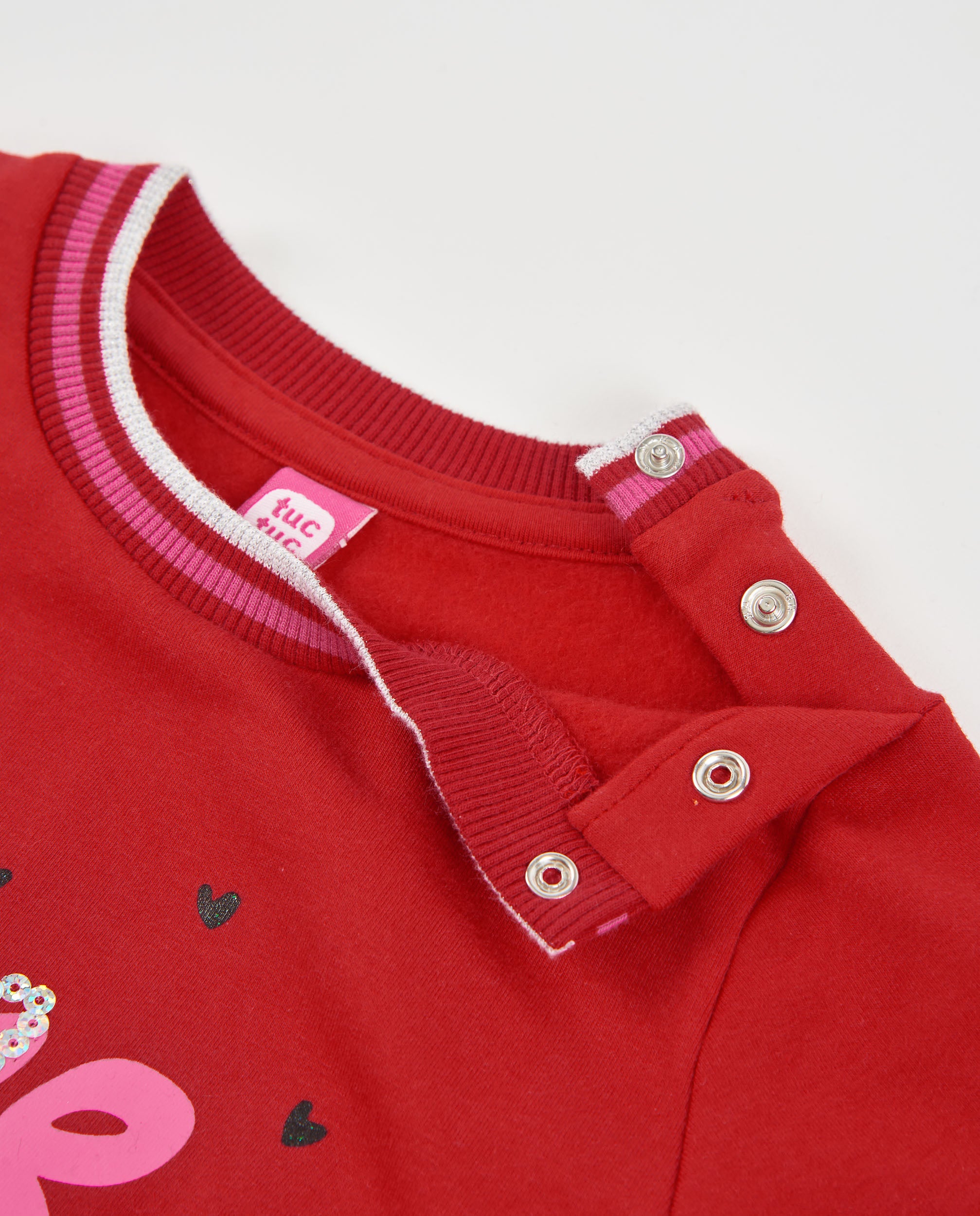 Vestido de niña de felpa con volantes en el bajo y estampado