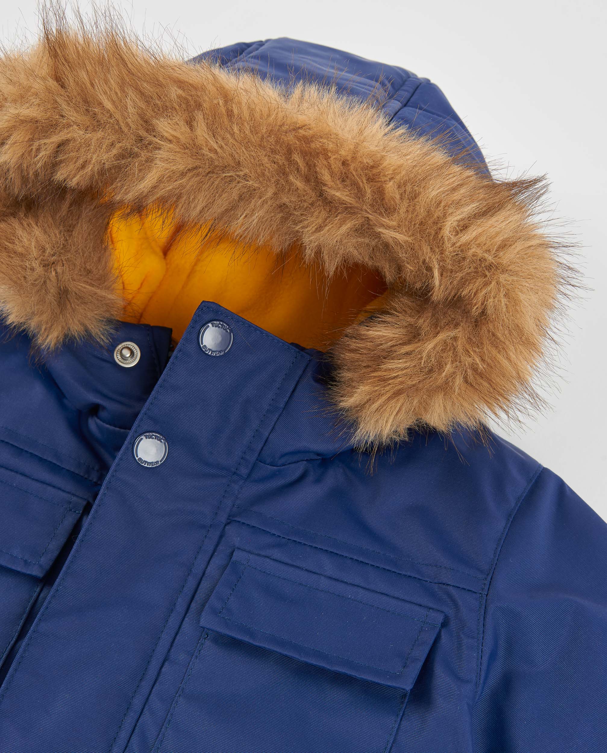 Abrigo de niño con capucha de ribete de pelo y forro polar