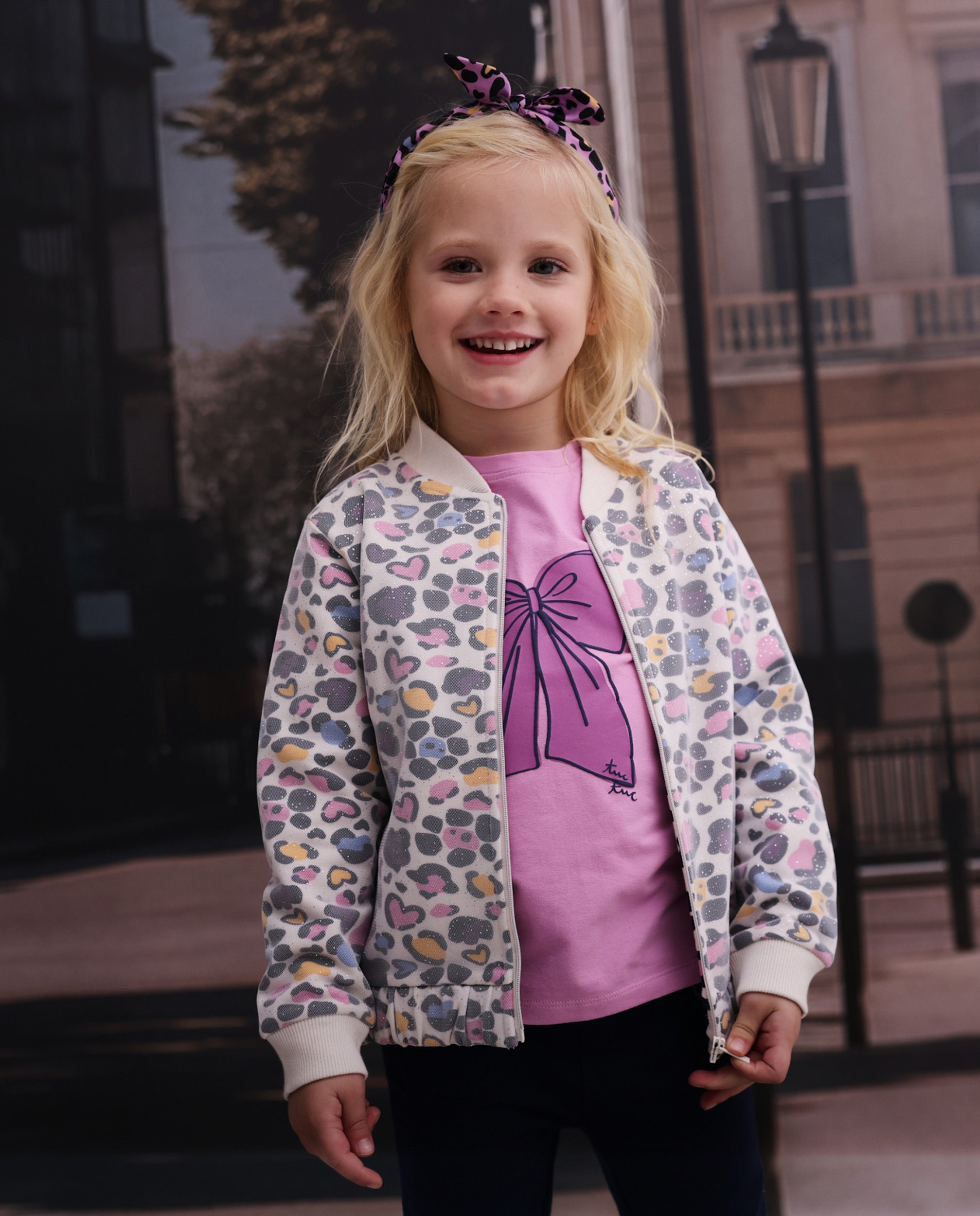 Camiseta de niña de punto con detalle de lazo y gráfico divertido