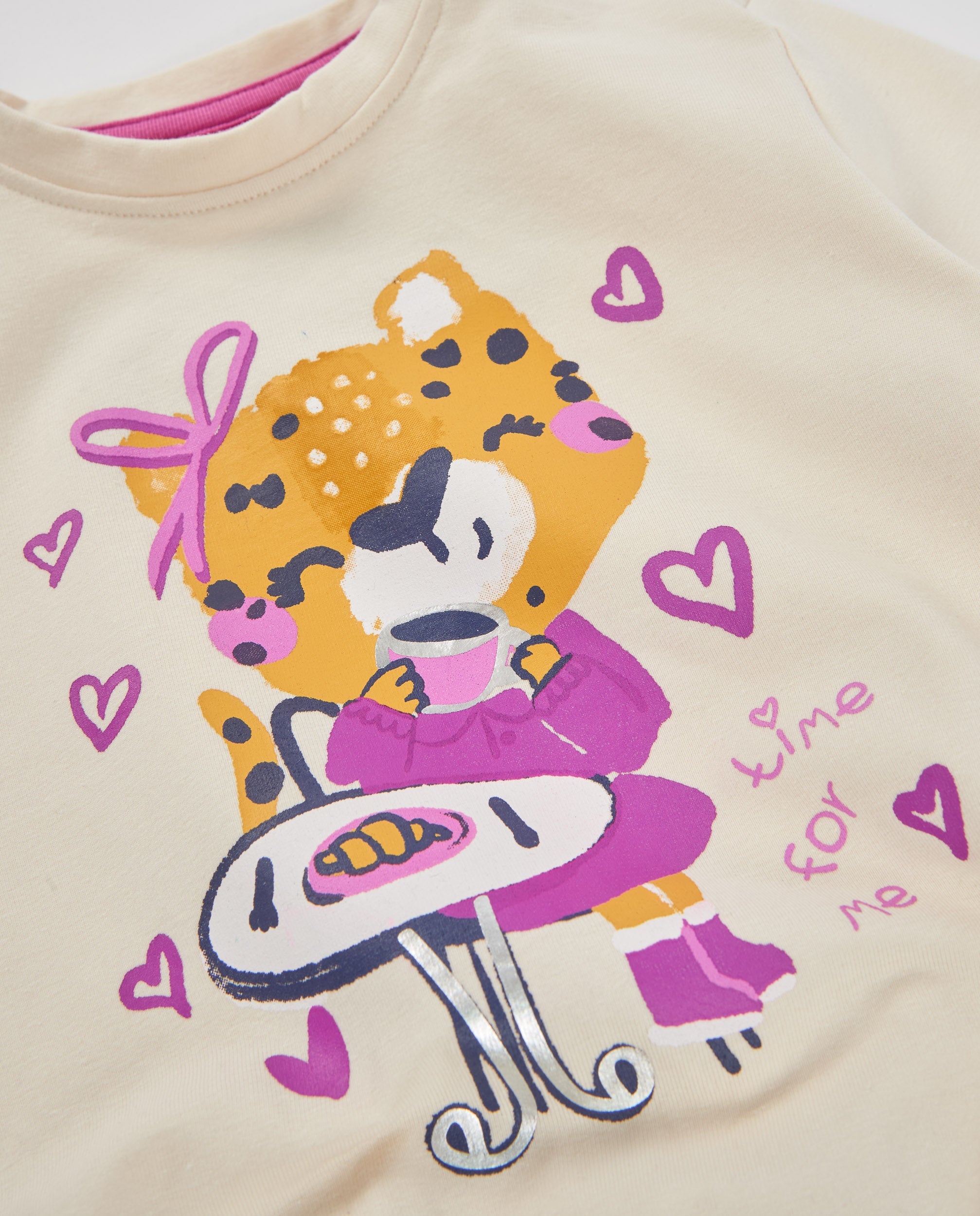 Camiseta de niña de punto con dibujo leopardo y detalle de lazo