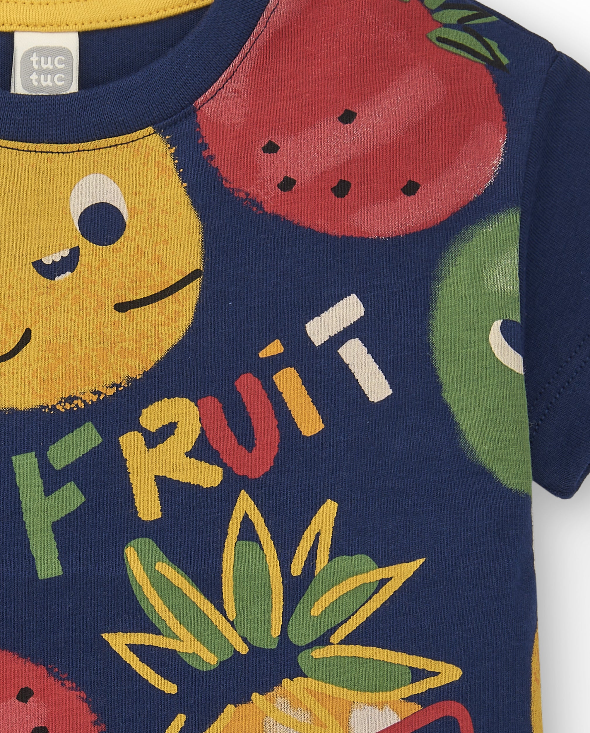 Camiseta de niño en azul marino con estampado de frutas