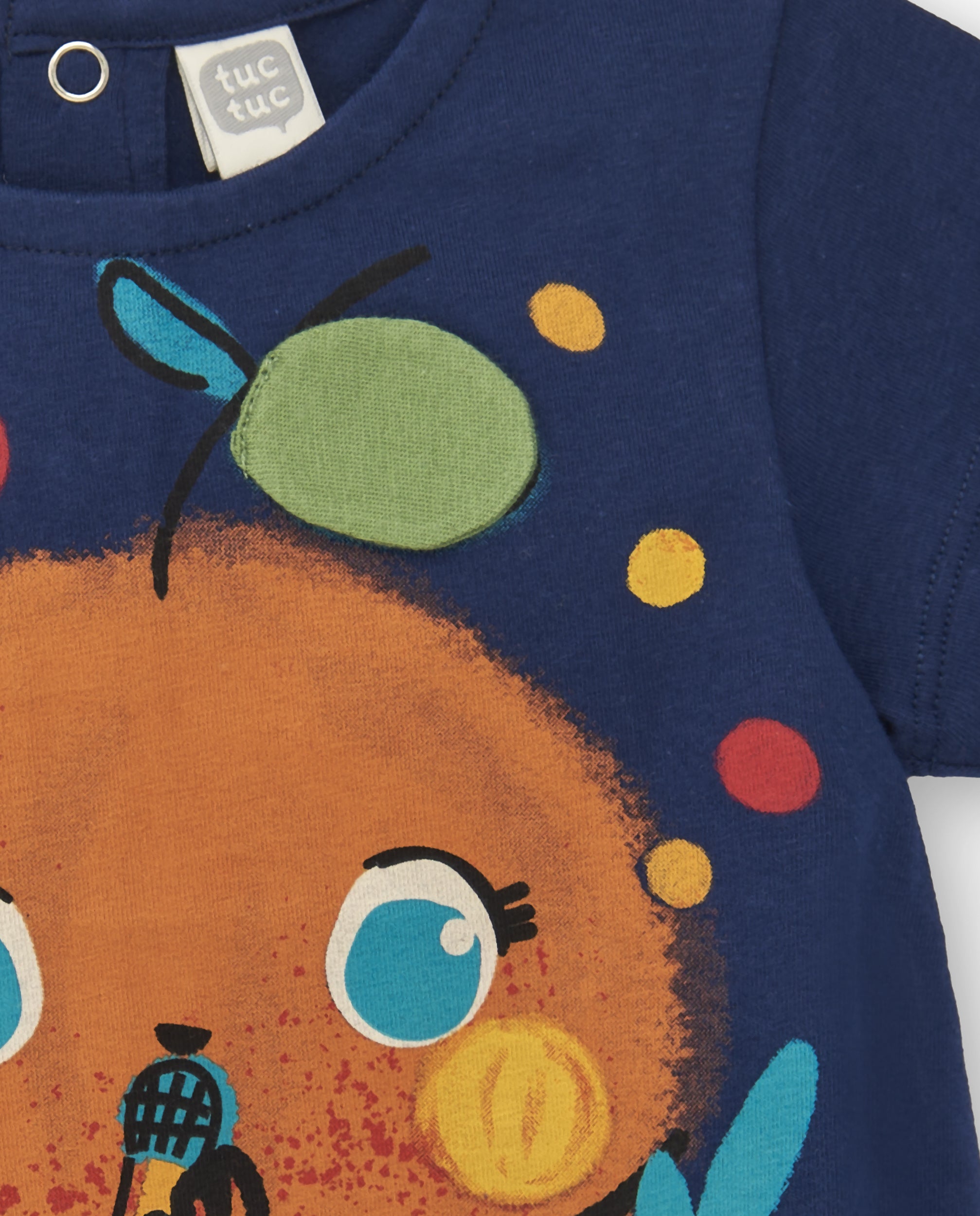 Camiseta de niña en azul marino con diseño de fruta cantante