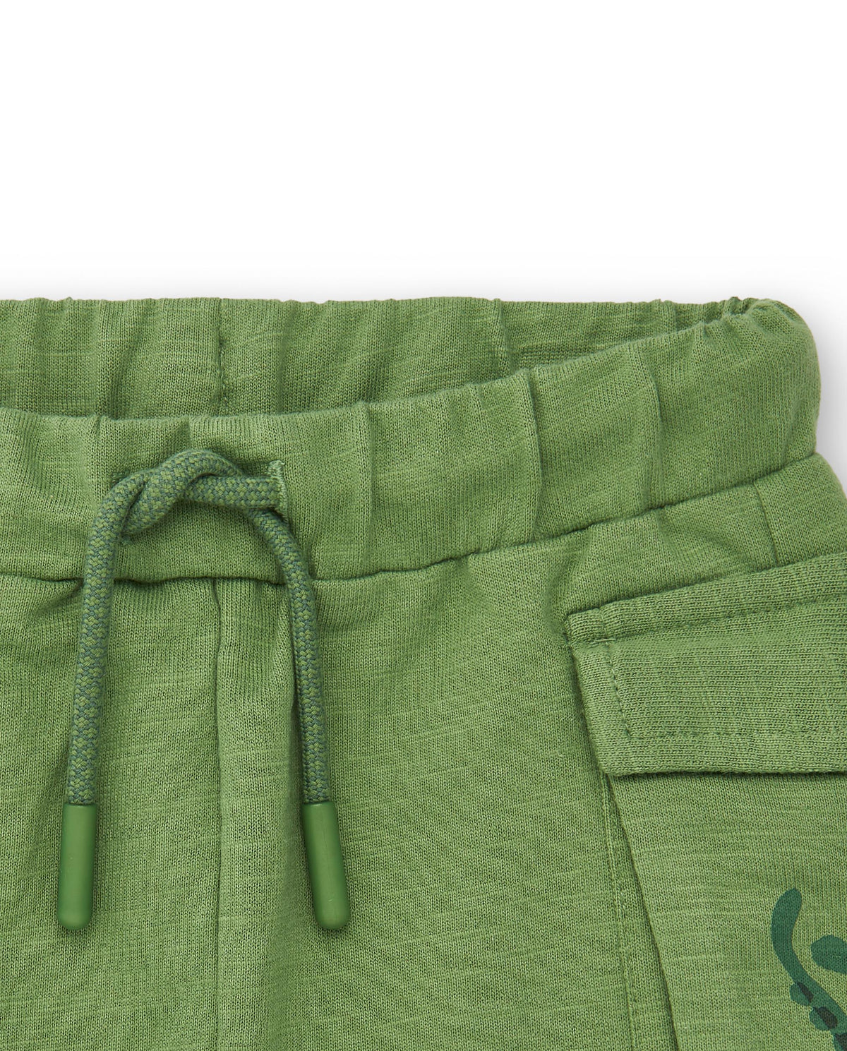 Shorts de niño en color verde con bolsillos y estampado musical colección Music up