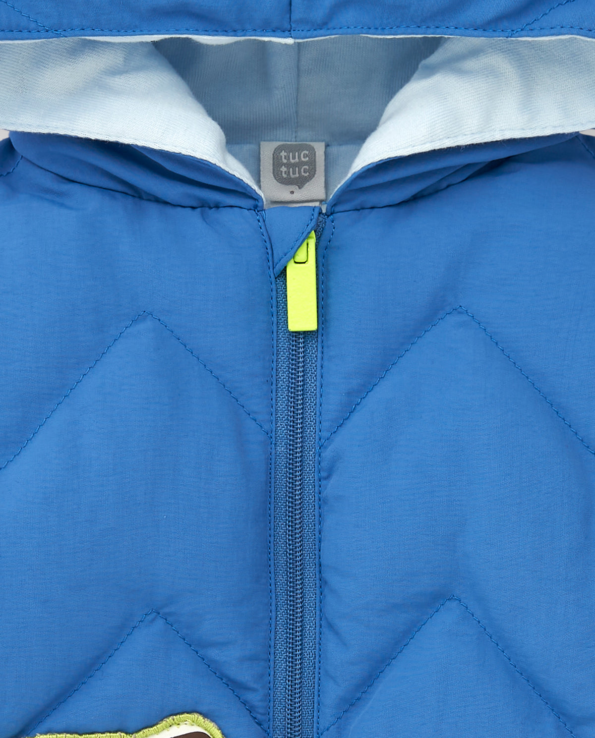 Chaqueta acolchada para niño en azul con capucha y detalles de
