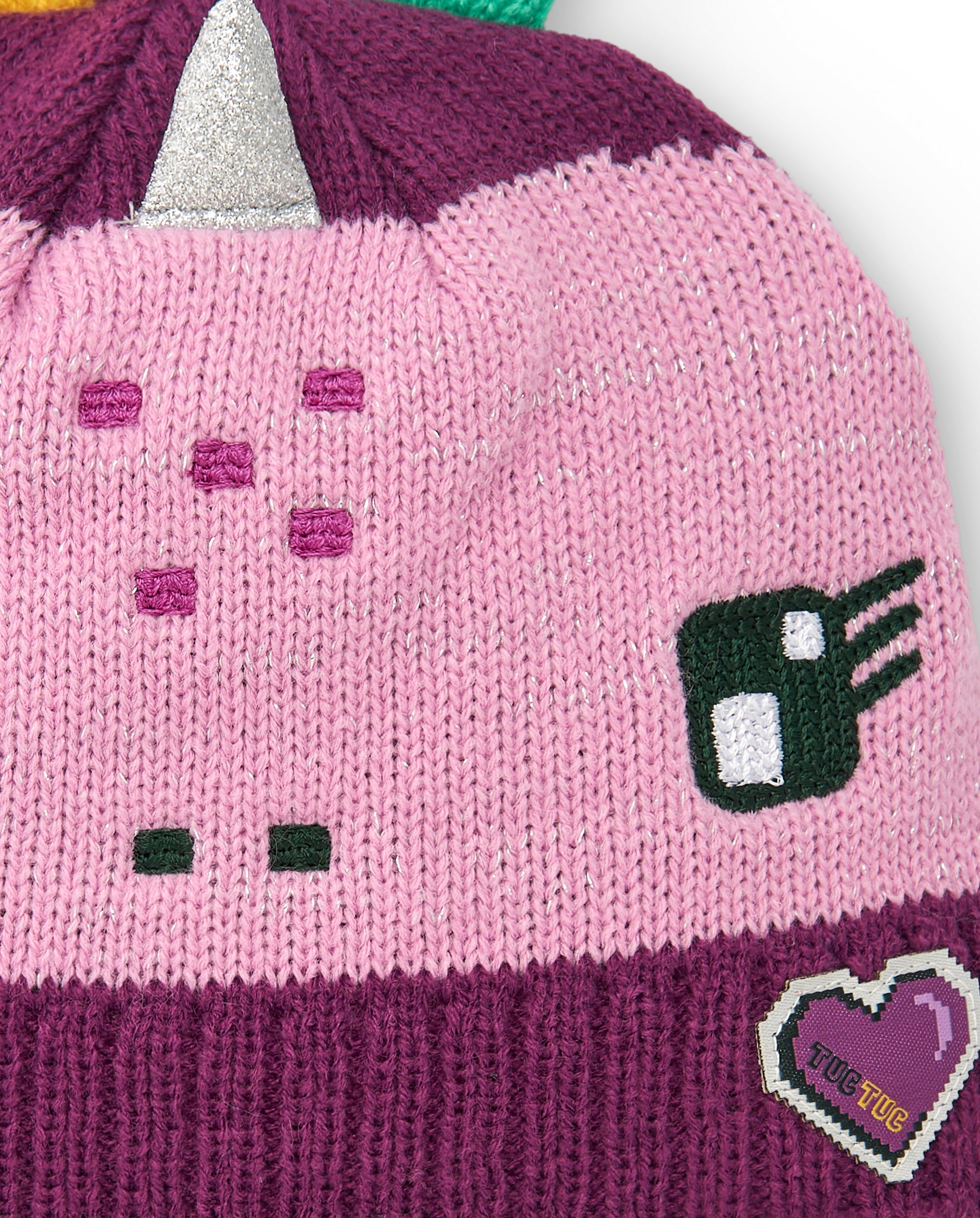 Gorro para niña en tonos rosado y fucsia con diseño de