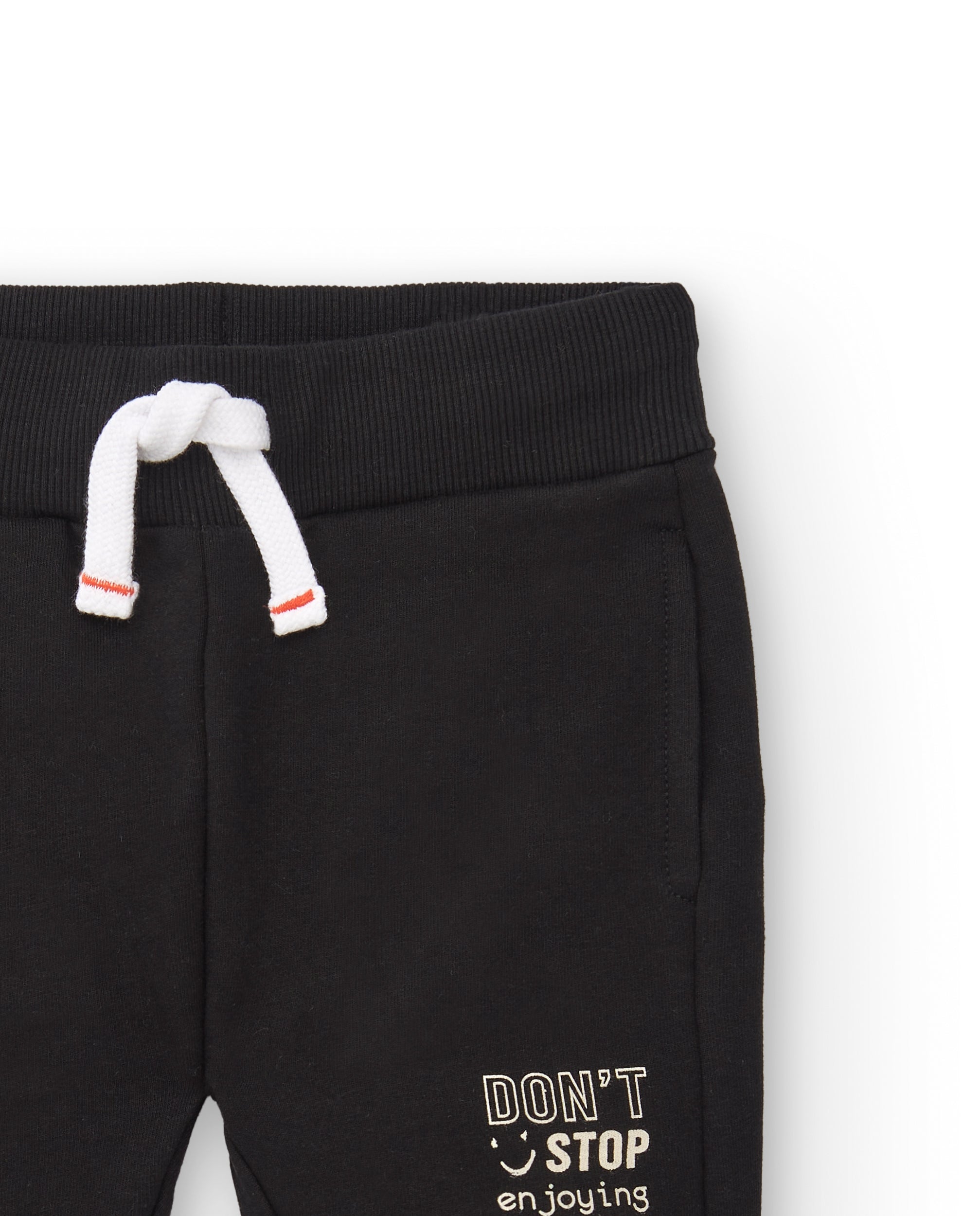 Pantalón felpa niño en negro con detalle "Don't Stop" colección