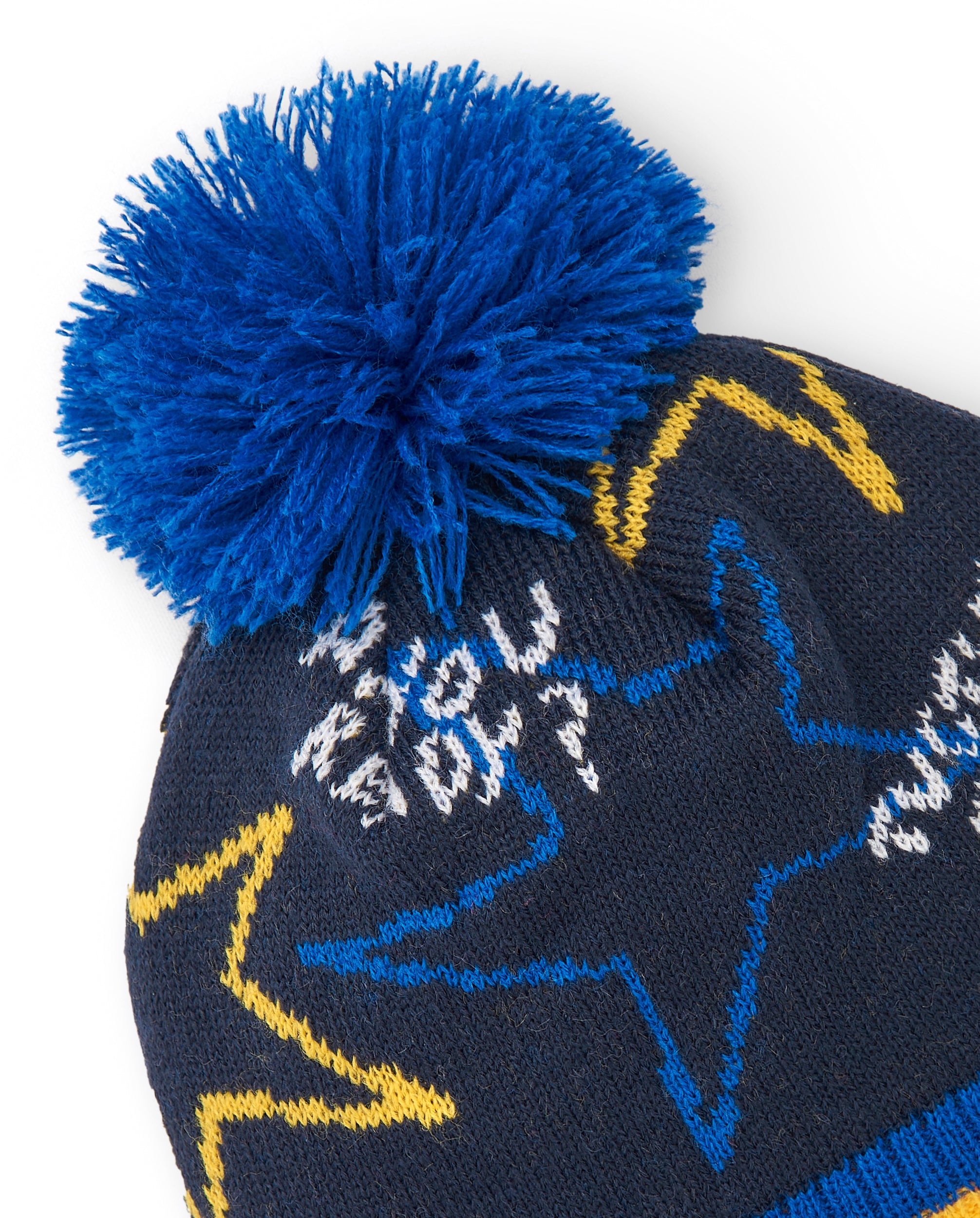 Gorro tricot niño en azul marino con estrellas y pompón