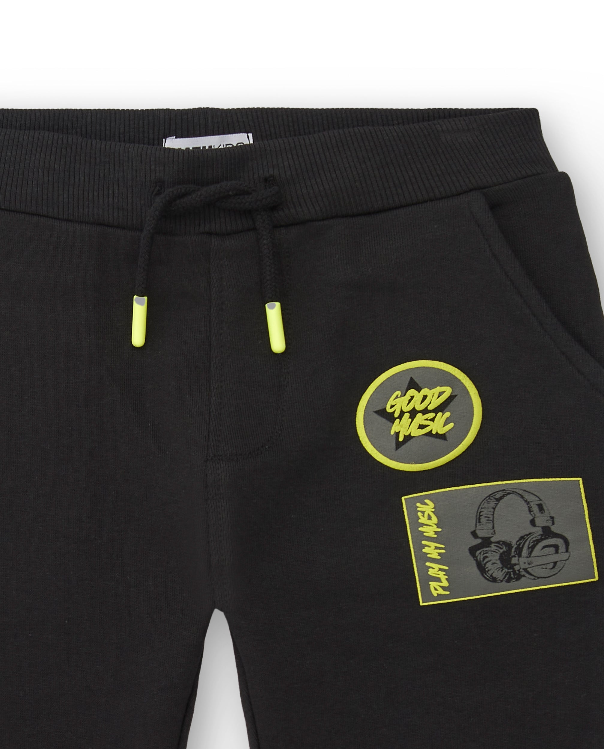 Pantalones de chándal negros con detalles gráficos para niño de