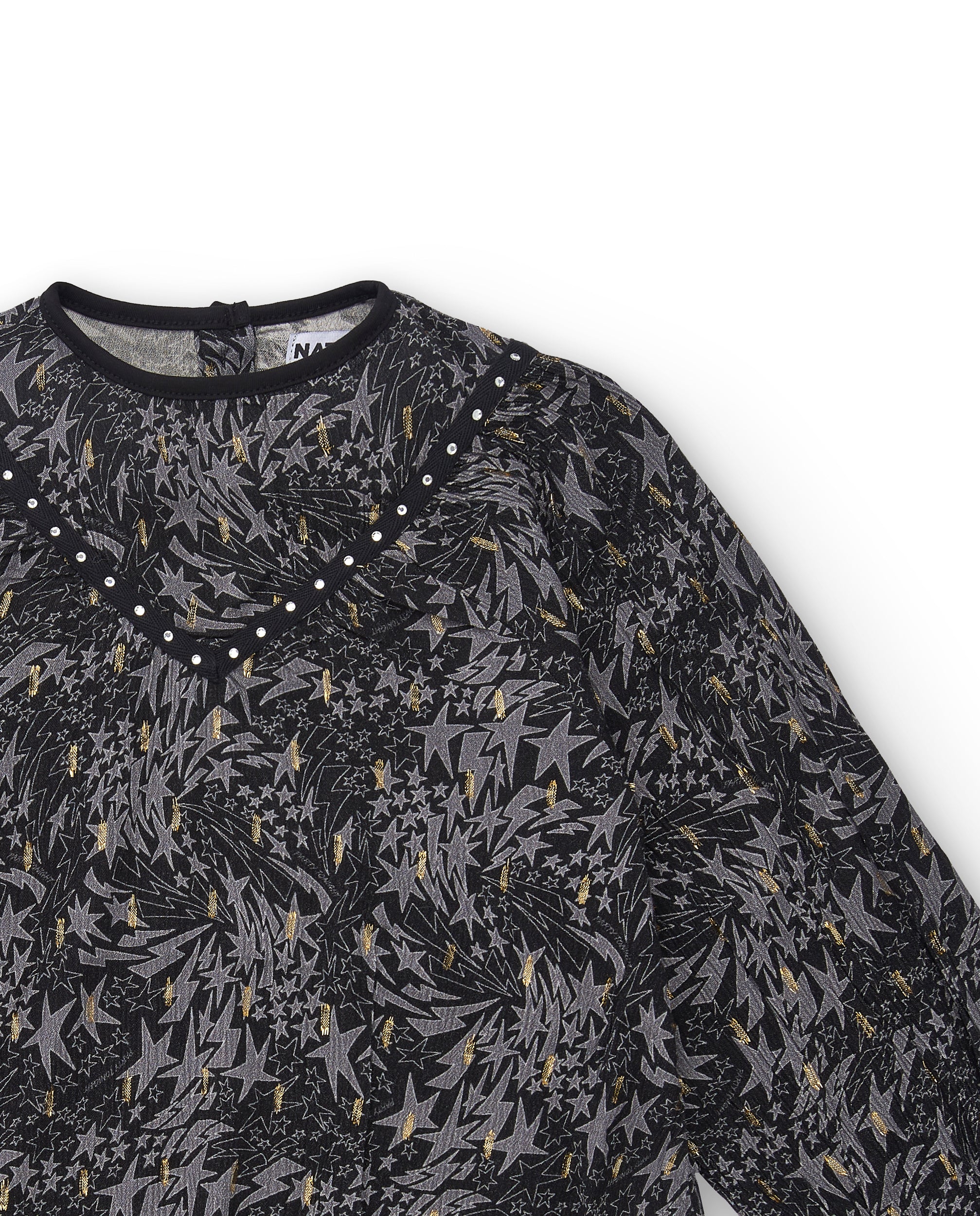 Blusa estampada en negro con detalles de apliques brillantes
