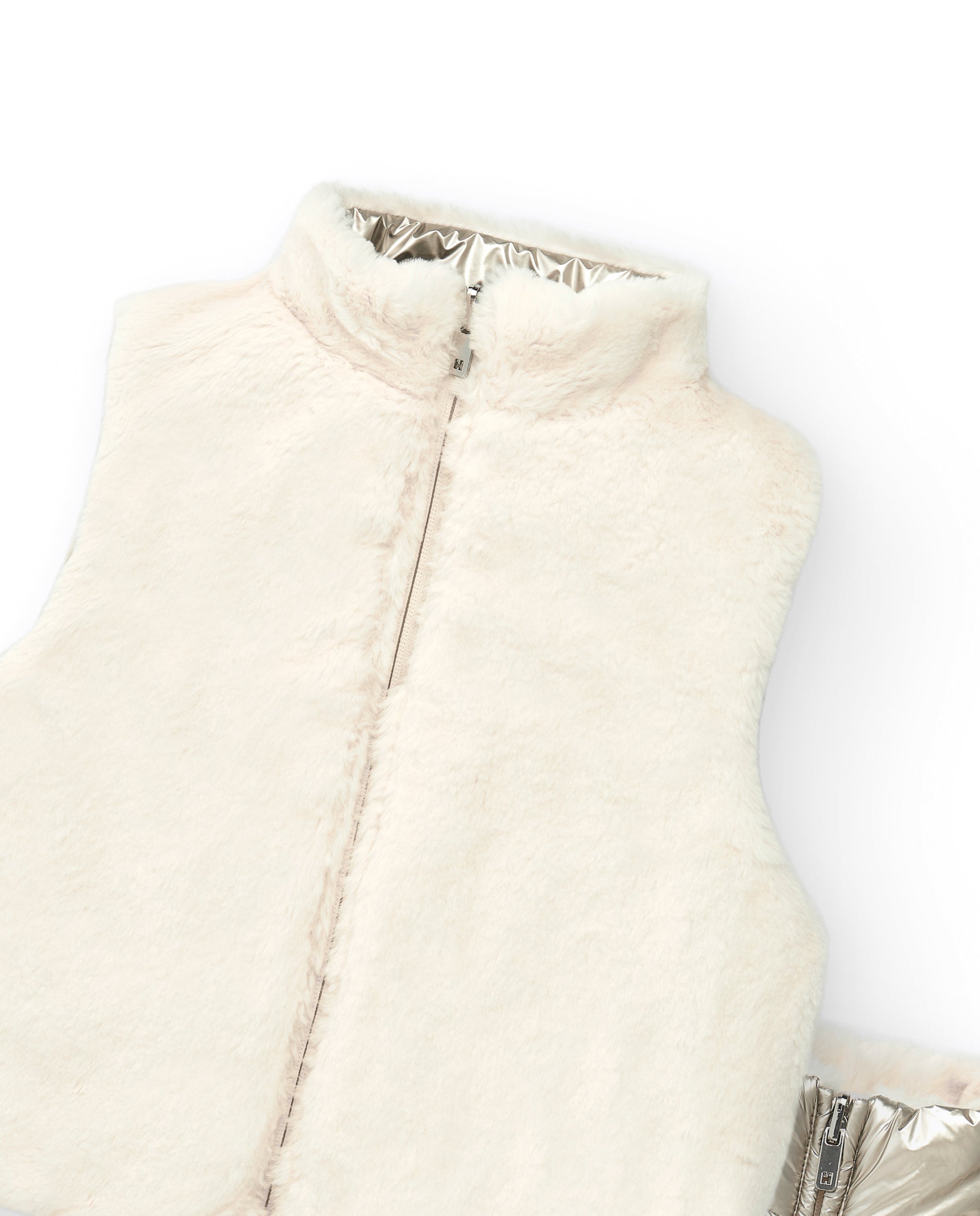 Chaleco reversible en color crema y plateado para niña