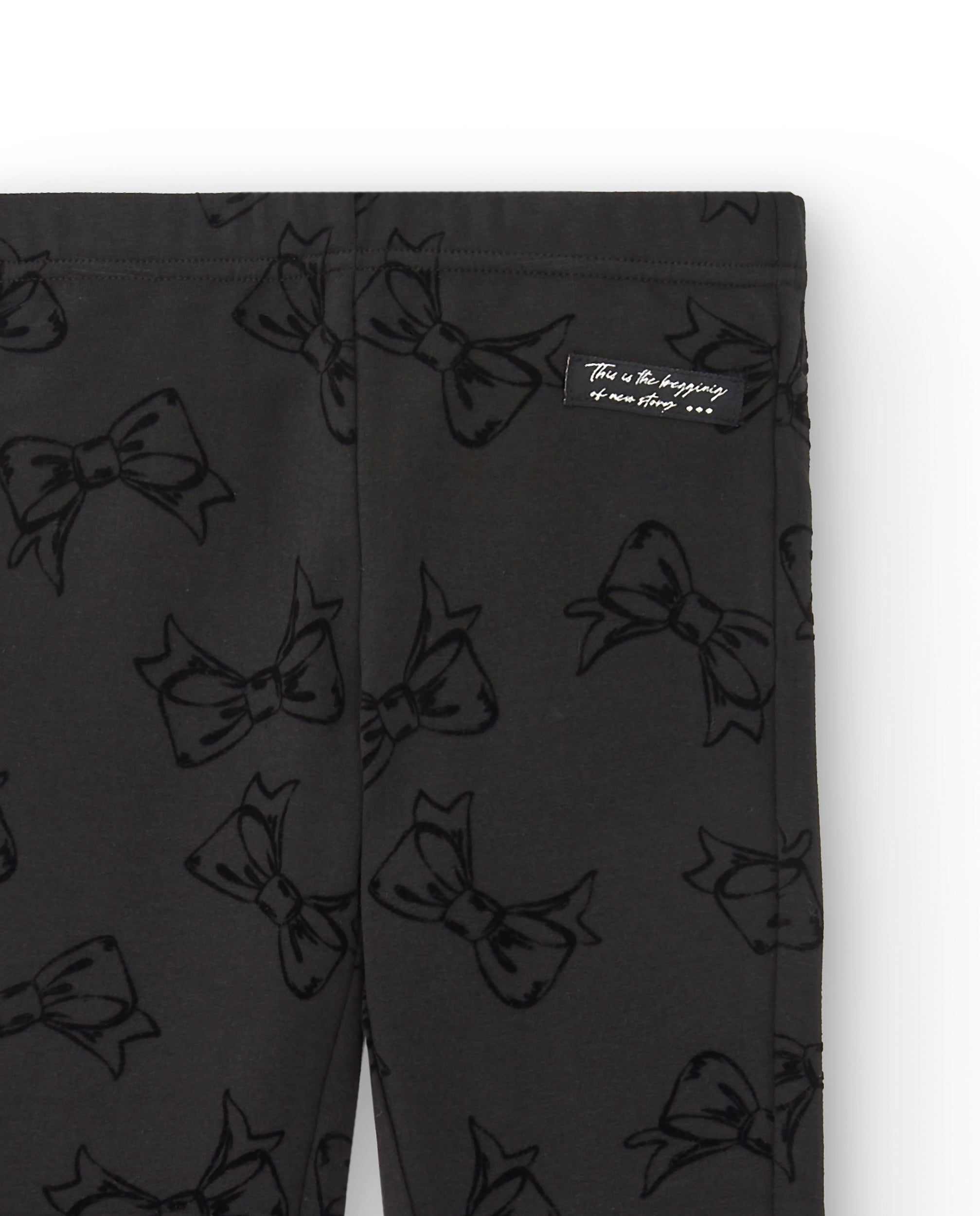 Leggings negros con estampado de lazos para niña colección