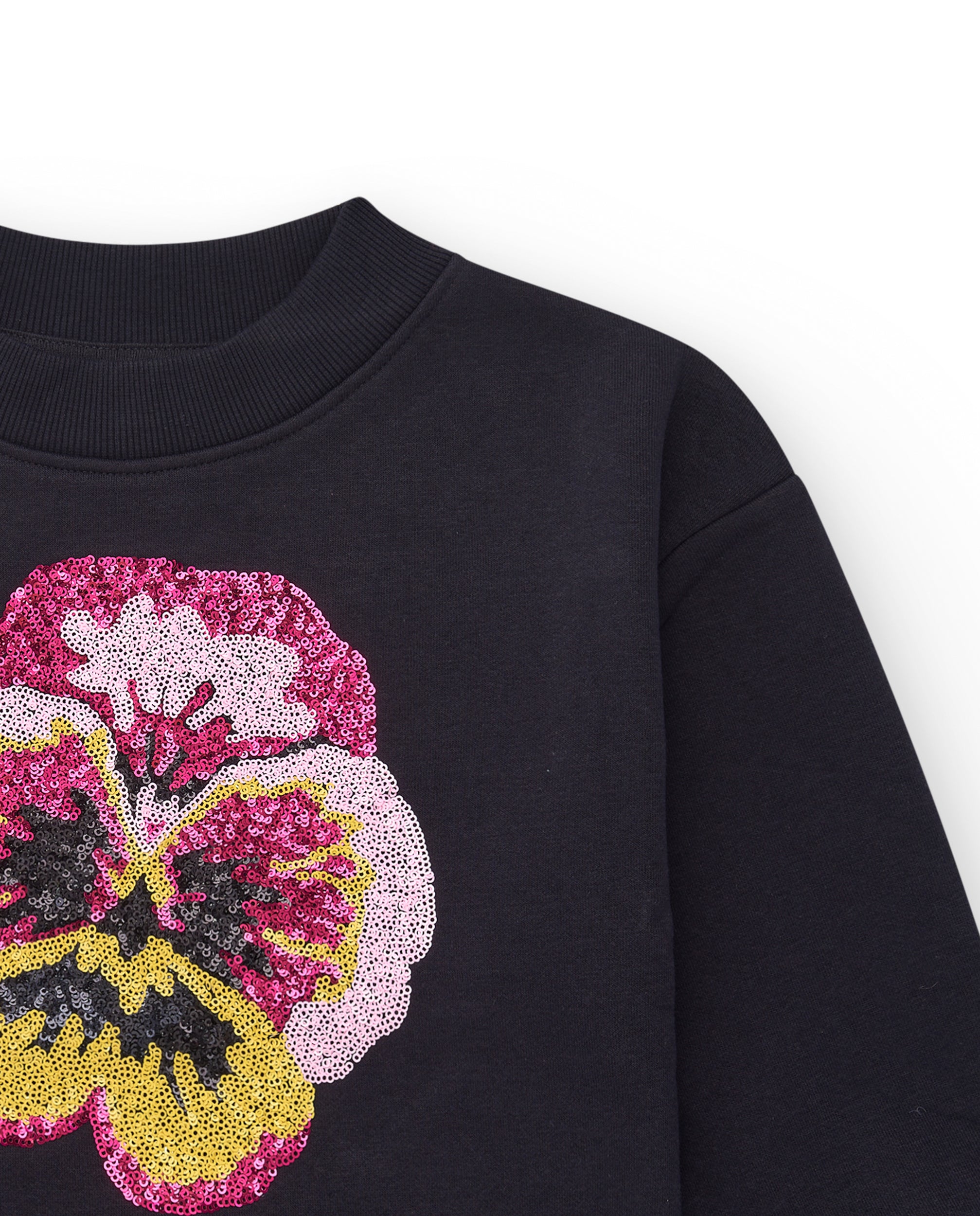 Sudadera negra con flor de lentejuelas para niña colección