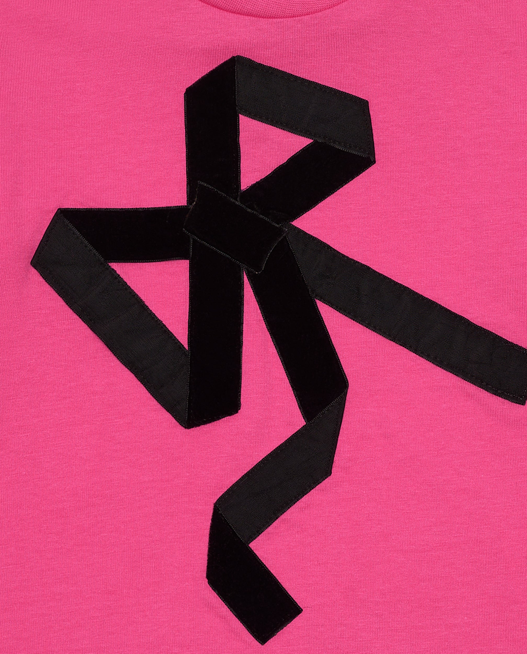 Camiseta rosa con lazo negro para niña colección Magic Poetry