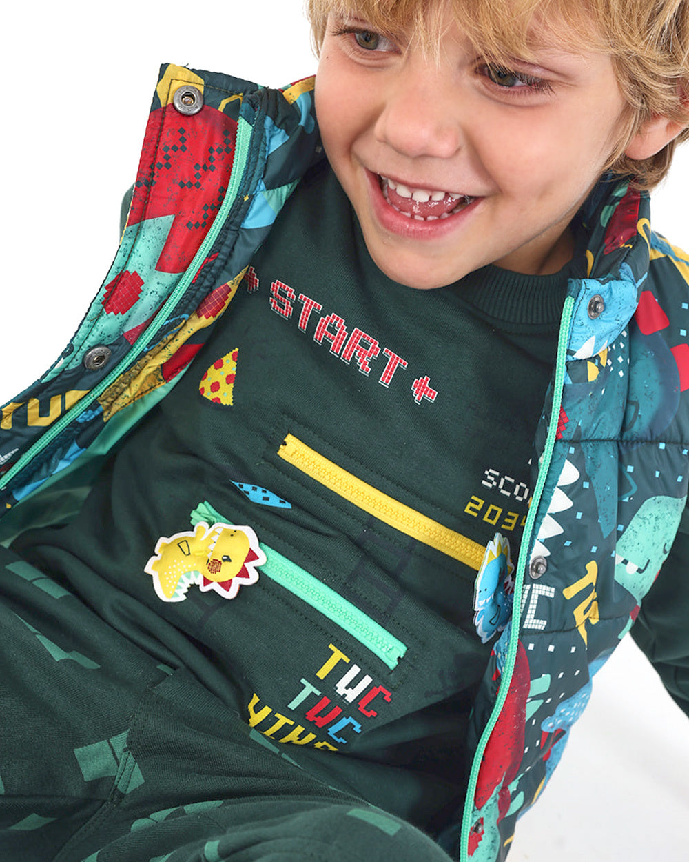 Chaleco acolchado para niño con estampado de dinosaurios