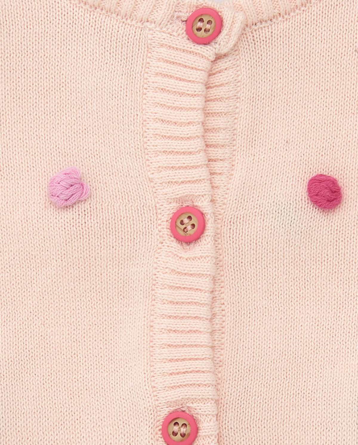 Chaqueta rosa de tricot para niña con pompones multicolor y
