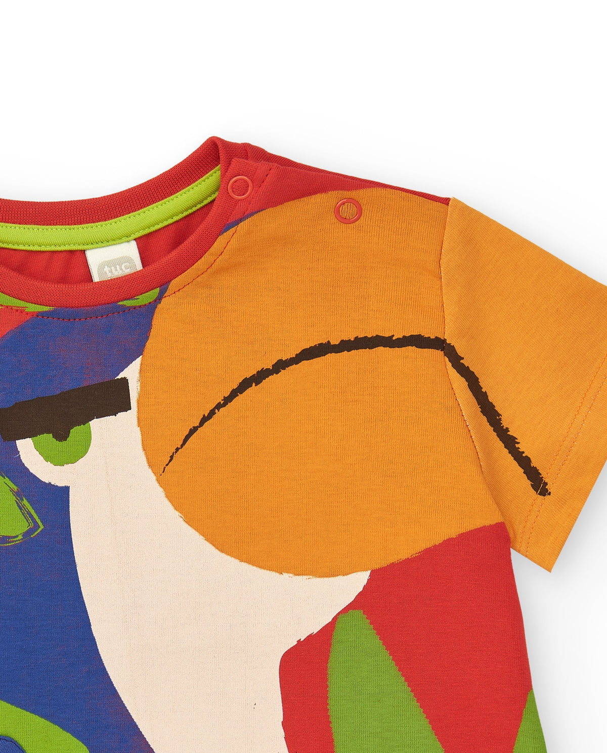 Camiseta multicolor para niño con tucán y apliques