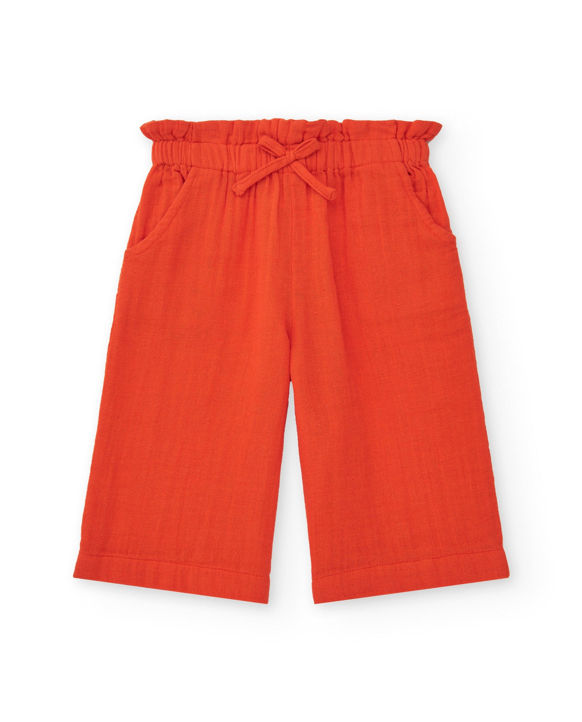 Pantalón culotte naranja para niña con cintura fruncida y lazo