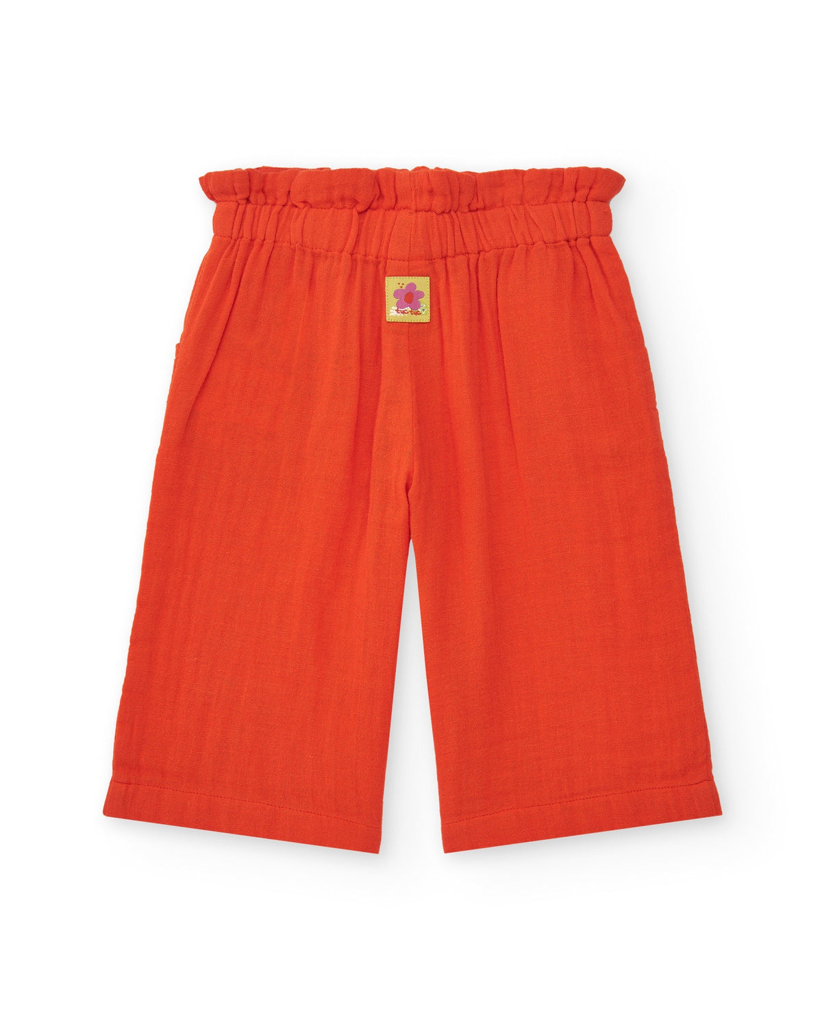 Pantalón culotte naranja para niña con cintura fruncida y lazo