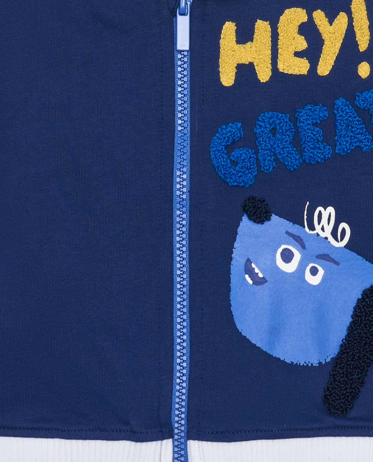 Chaqueta de felpa para niño en azul con detalles en blanco y