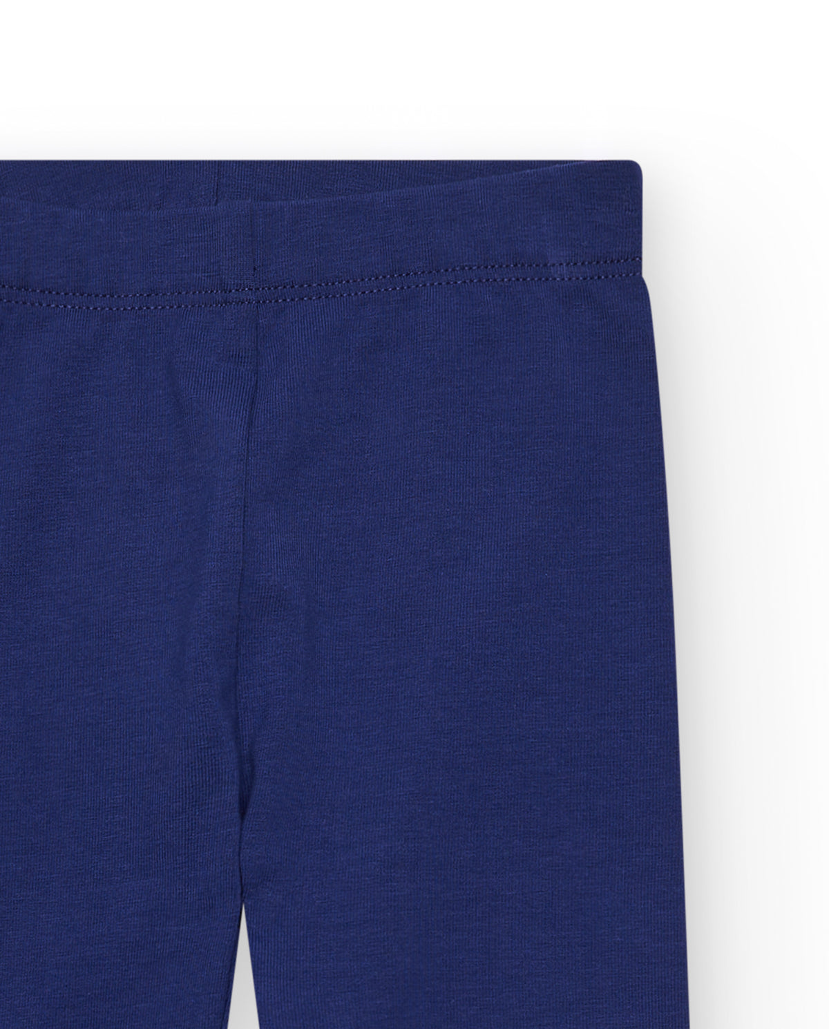 Leggings para niña en azul con detalle floral y cintura elástica
