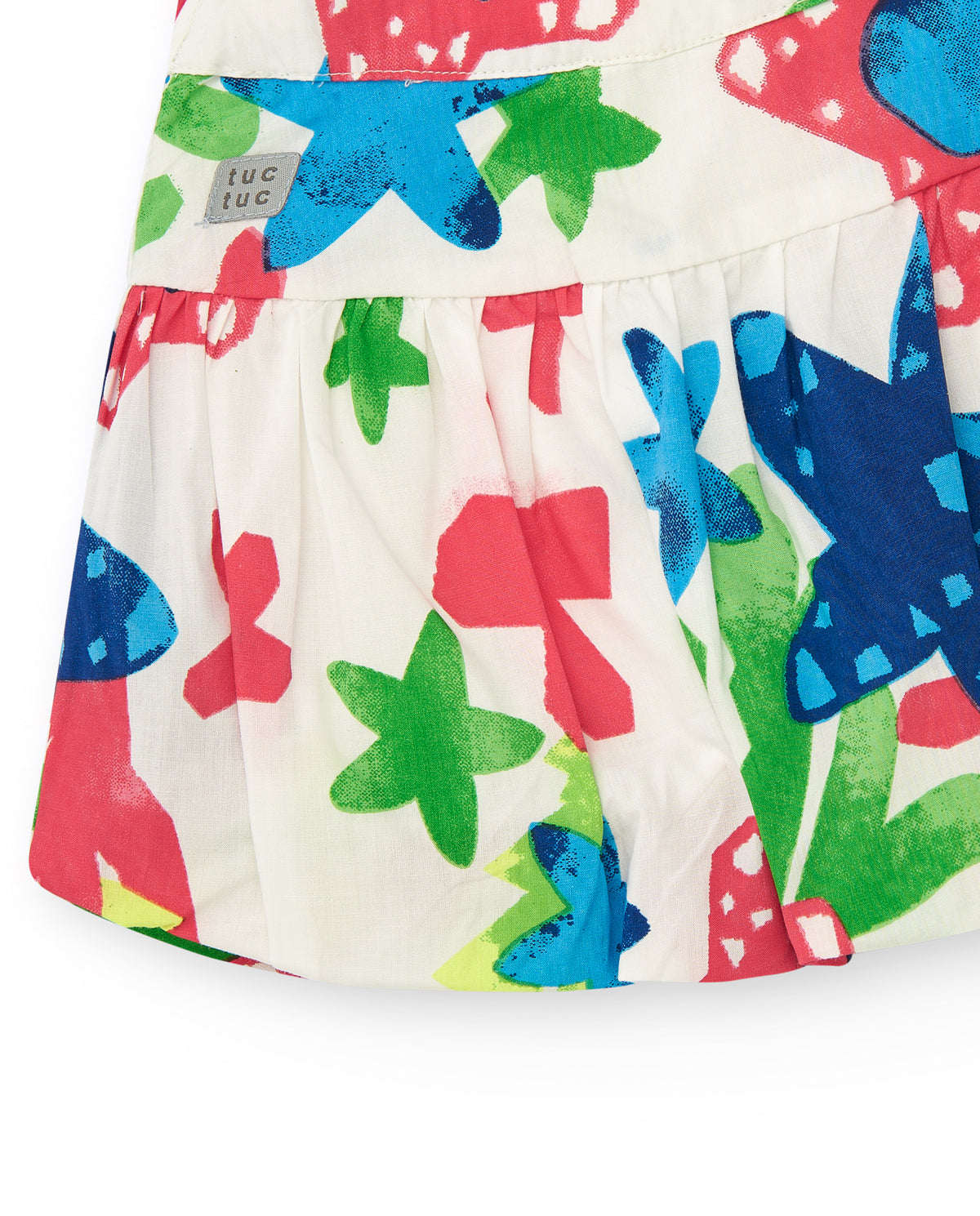 Falda para niña en blanco con estampado tropical multicolor
