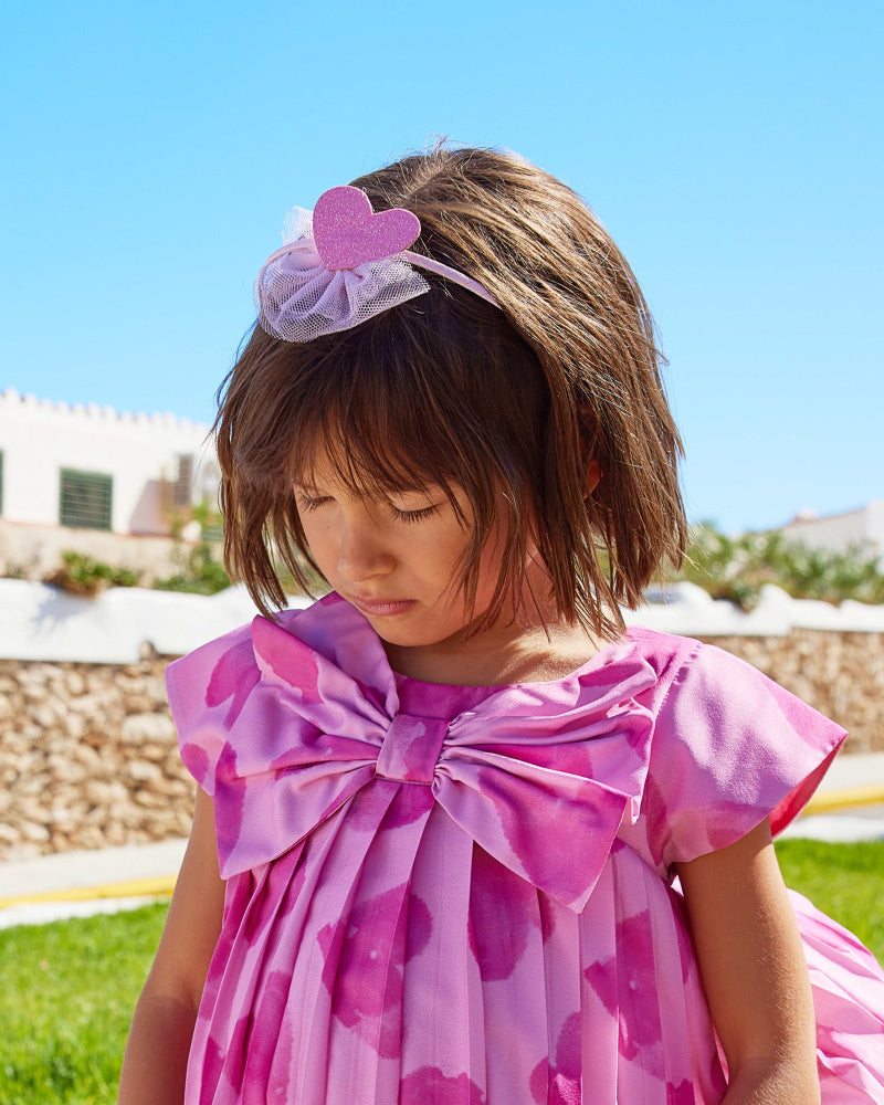 Diadema rosa rígida para niña con corazón decorativ