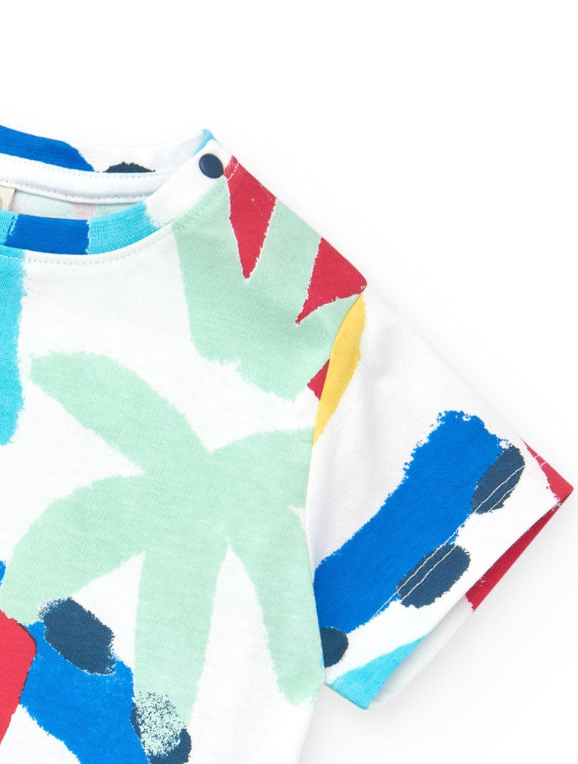 Camiseta para niño en blanco con estampado veraniego y cierre en el hombro