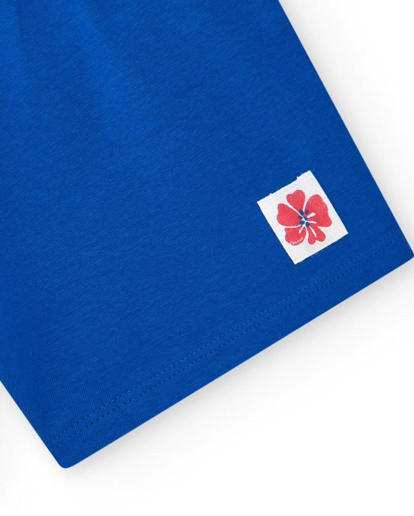 Pantalón corto para niña en azul con cintura elástica y lazo rojo