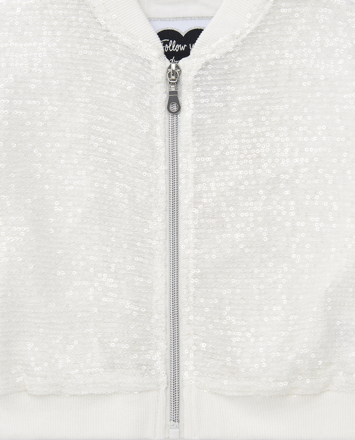 Chaqueta para niña en blanco con lentejuelas y cremallera