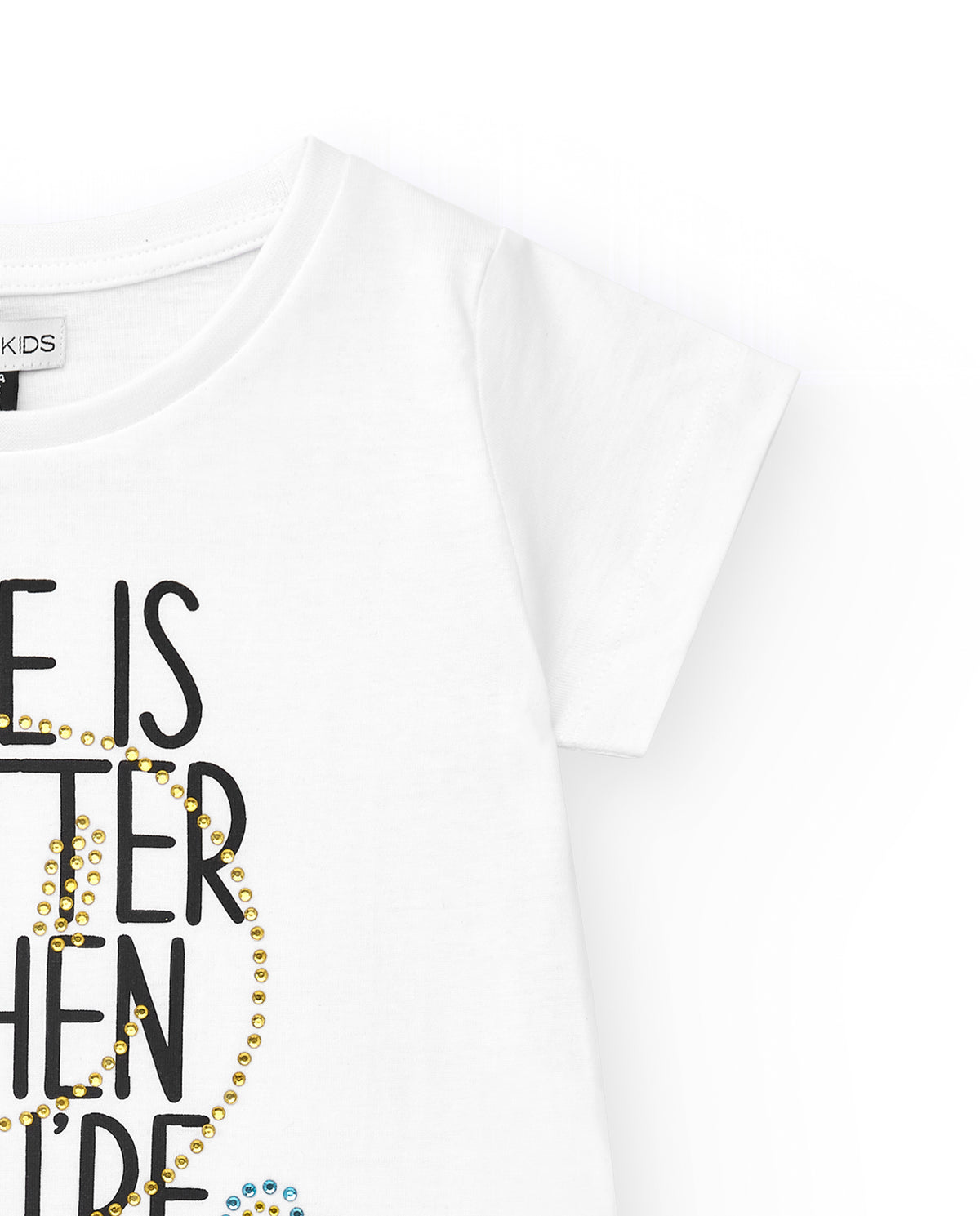Camiseta para niña en blanco de manga corta con detalles