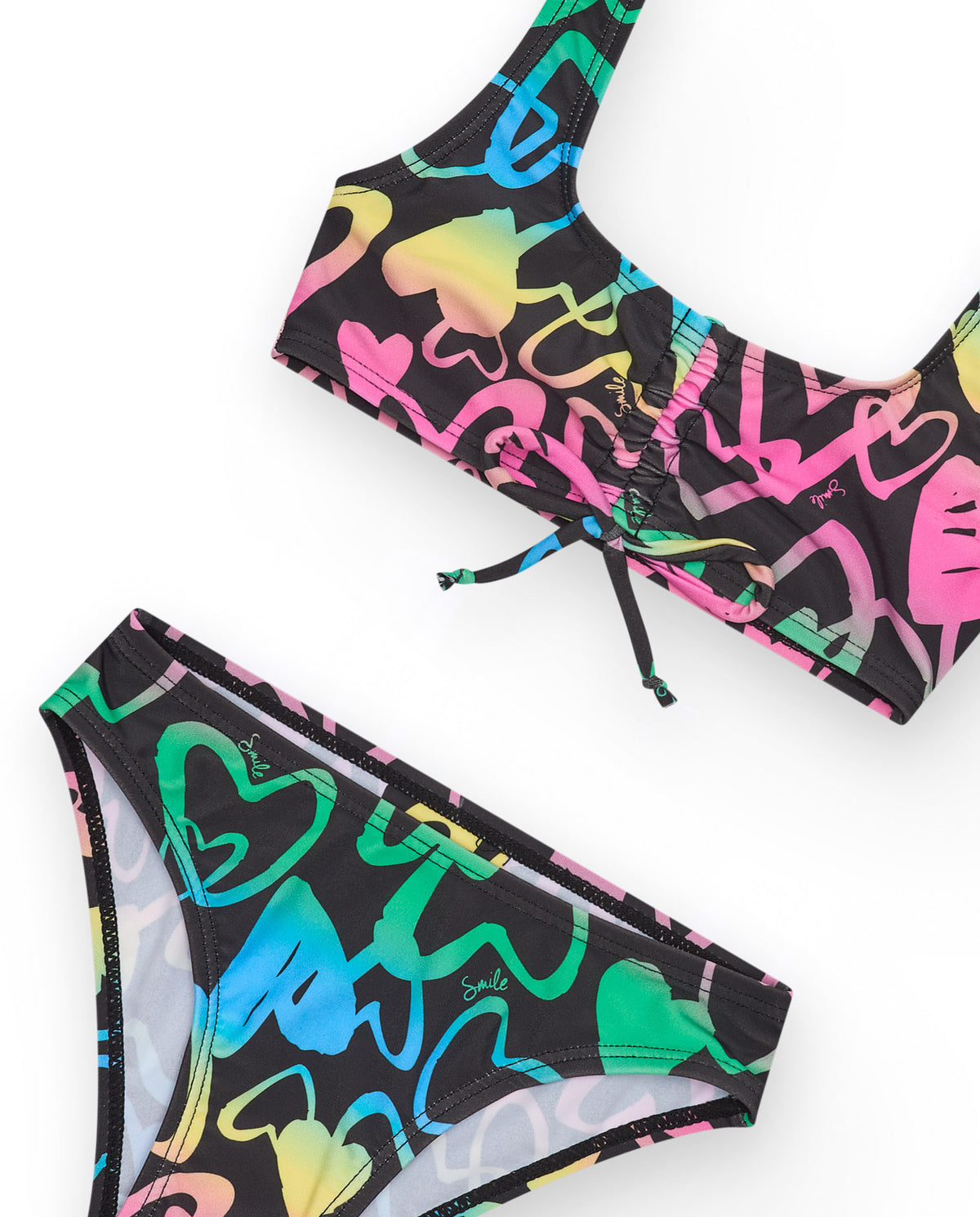 Bikini para niña en negro con corazones estampados y lazo