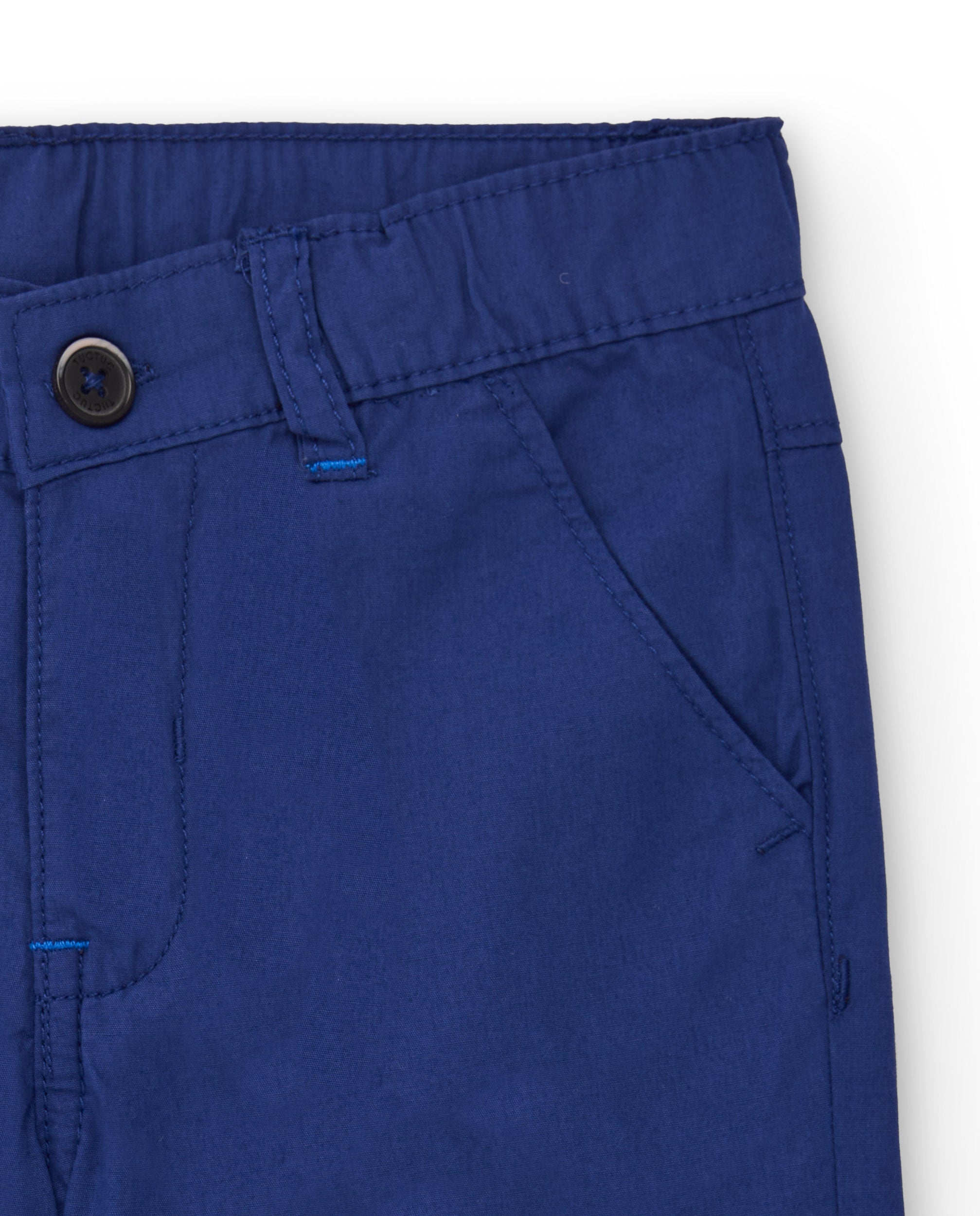 Bermuda para niño en azul con estampado de palmera