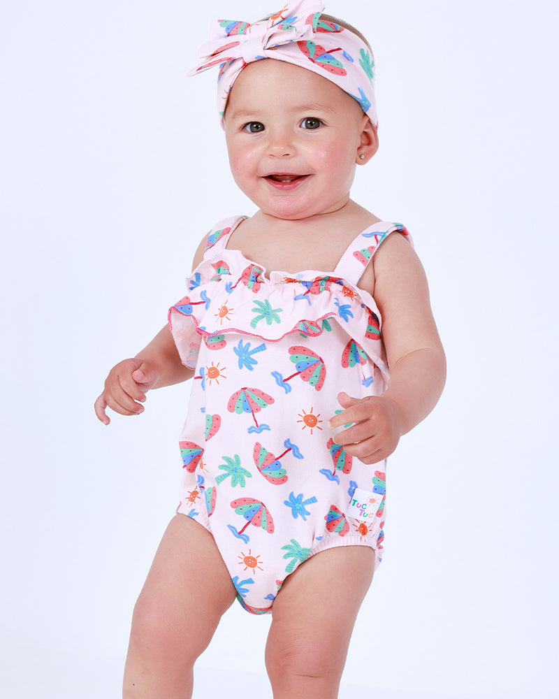 Body rosa para niña con estampado de paraguas, palmeras y soles