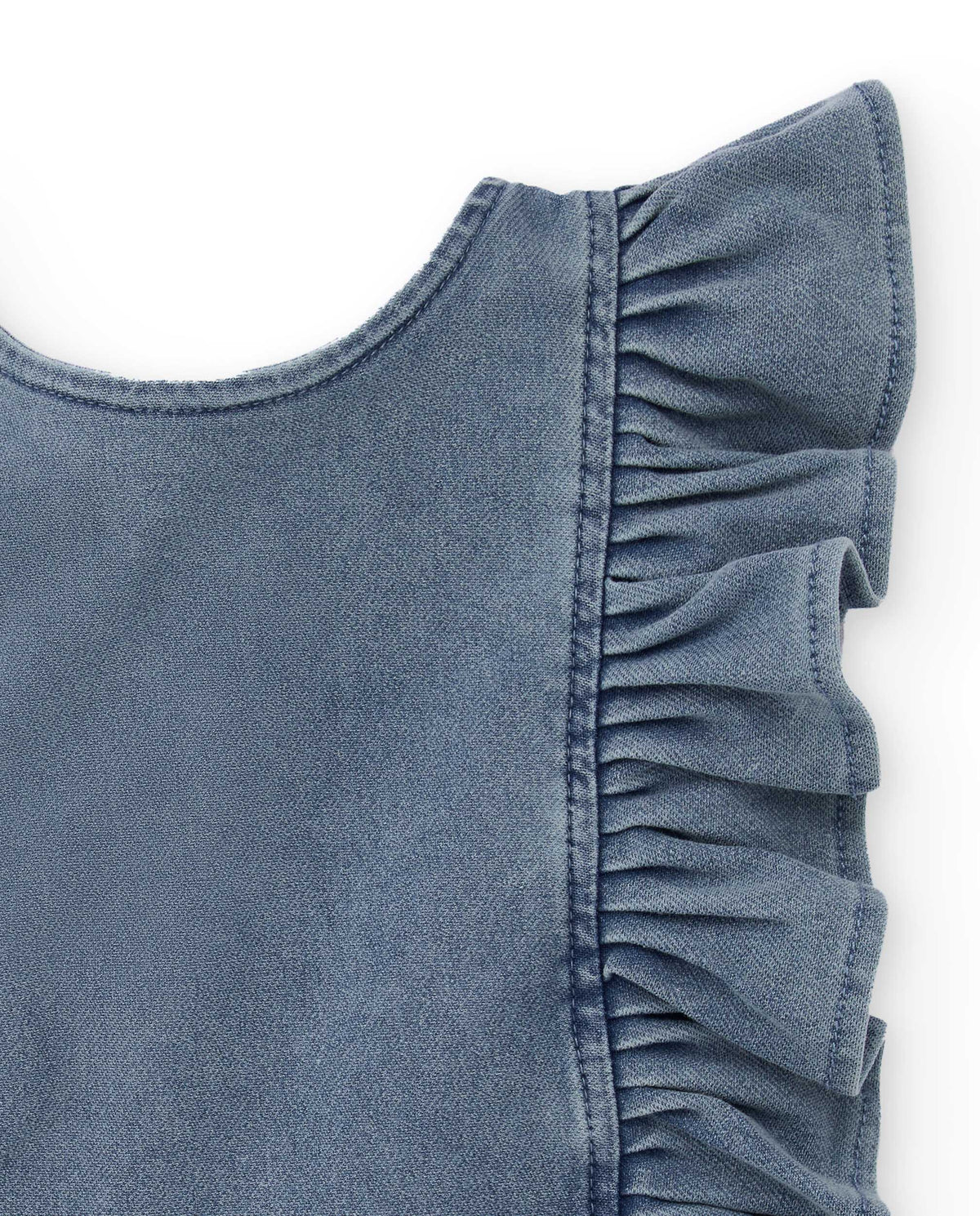 Blusa niña en denim azul con volantes en los hombros