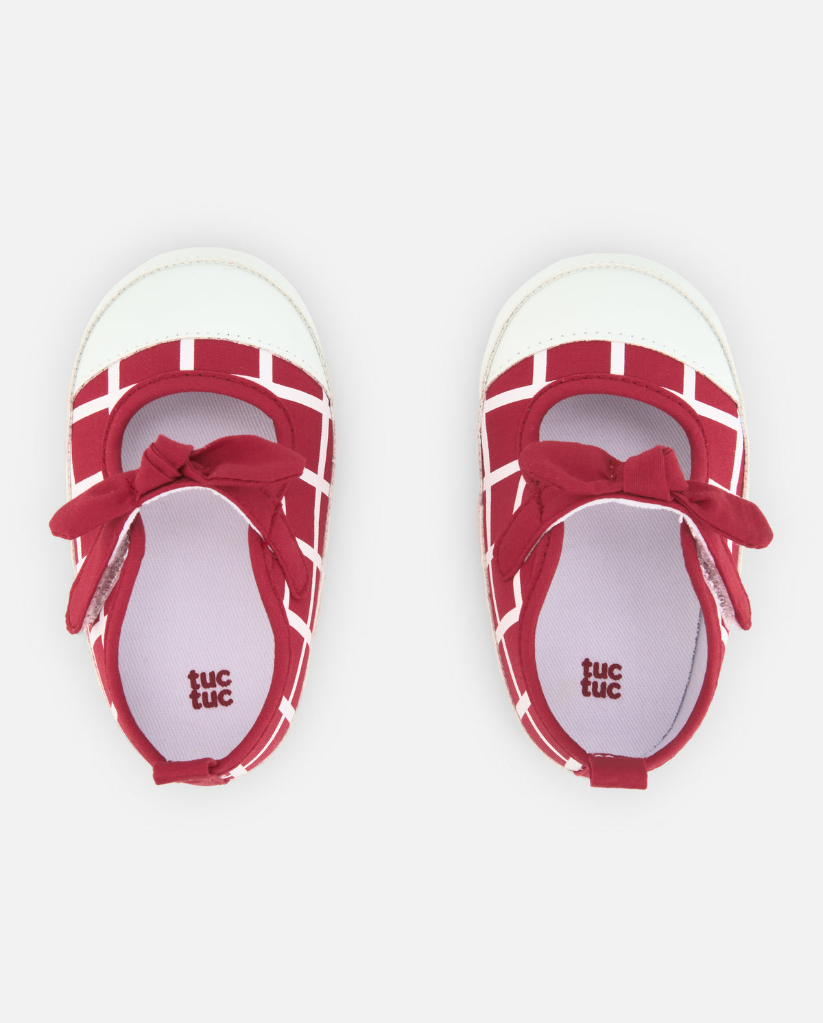 Merceditas de bebé niña en rojo con diseño de cuadros y lazo decorativo