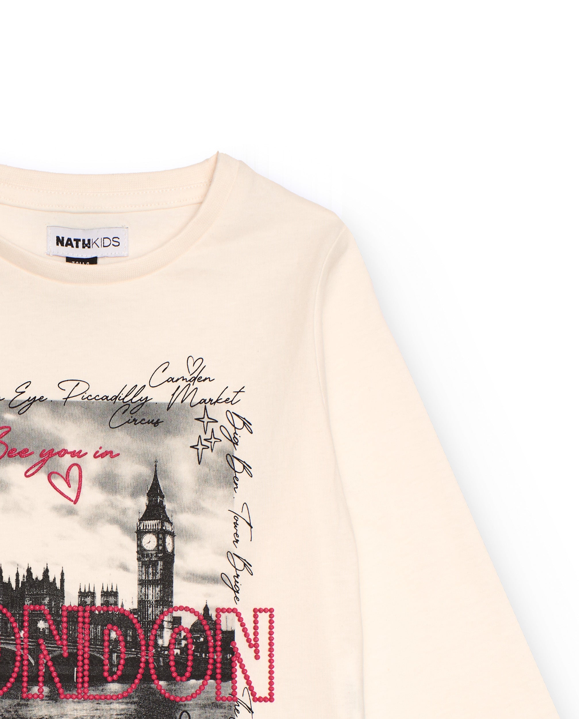 Camiseta de manga larga para niña color crudo con estampado de