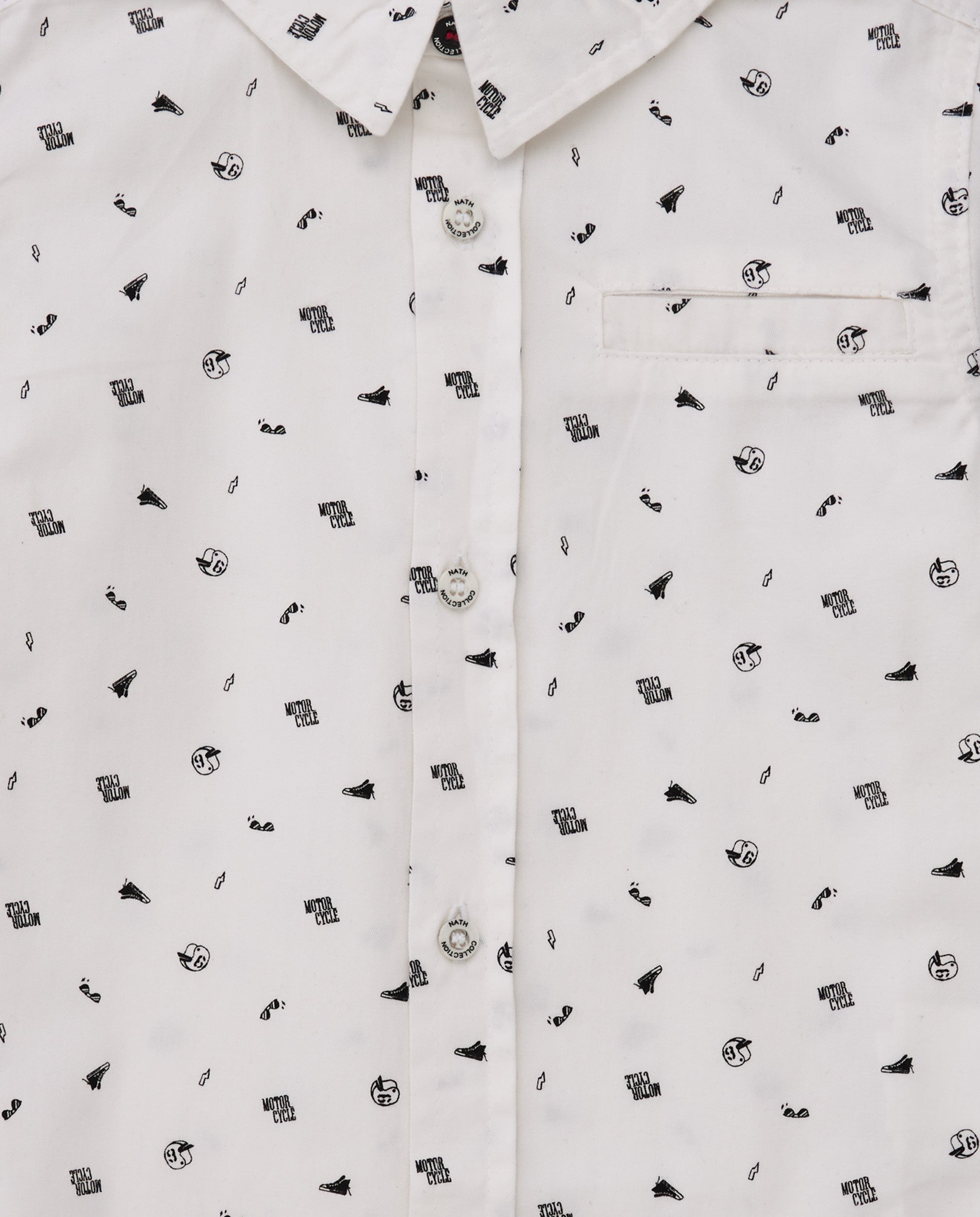 Camisa blanca de manga larga para niño con estampado pequeño