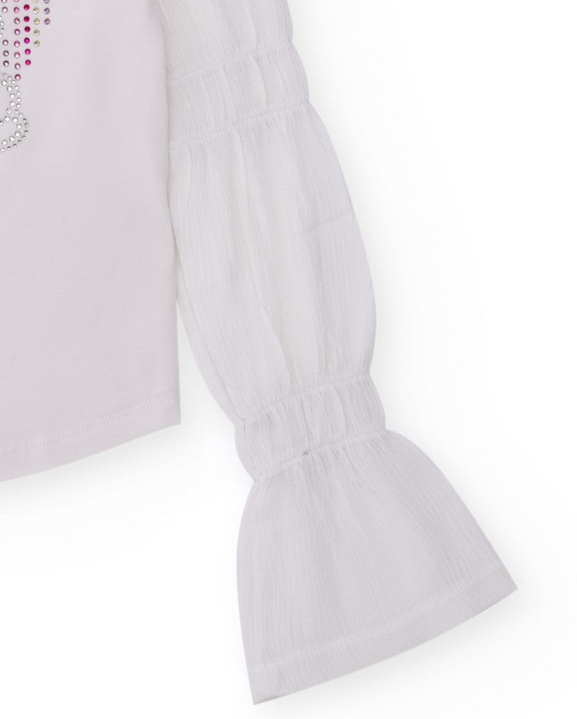 Camiseta blanca para niña con aplicaciones y mangas acampanadas